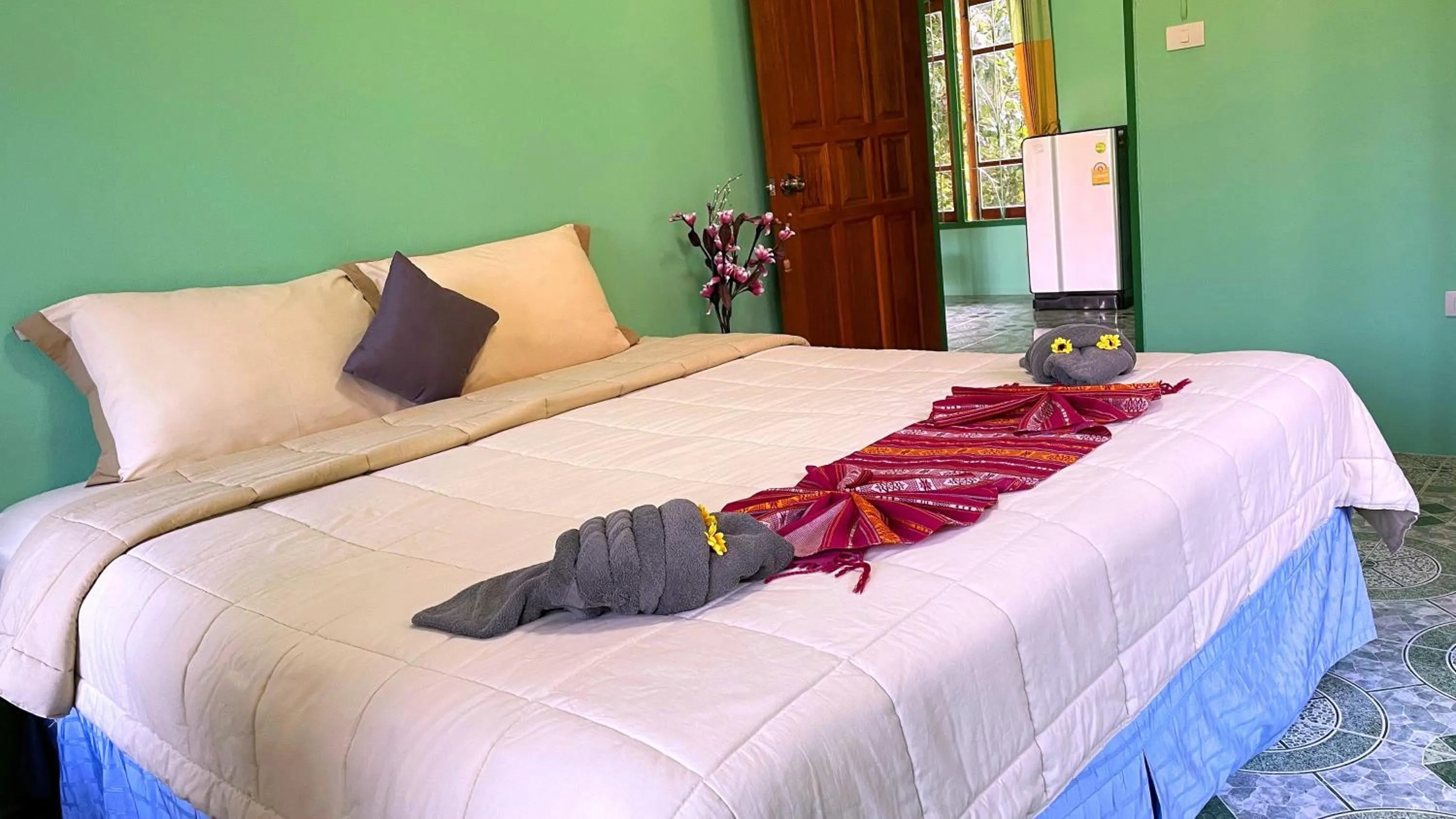 Bed in Swiss Chalet Garden, Pool Resort