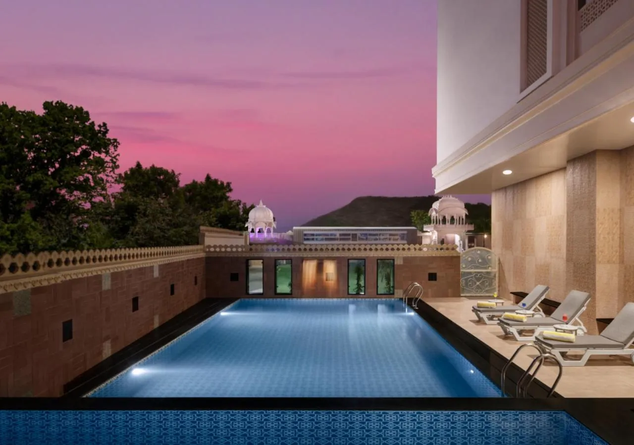 Swimming pool in juSTa Ssatva Resort, Udaipur