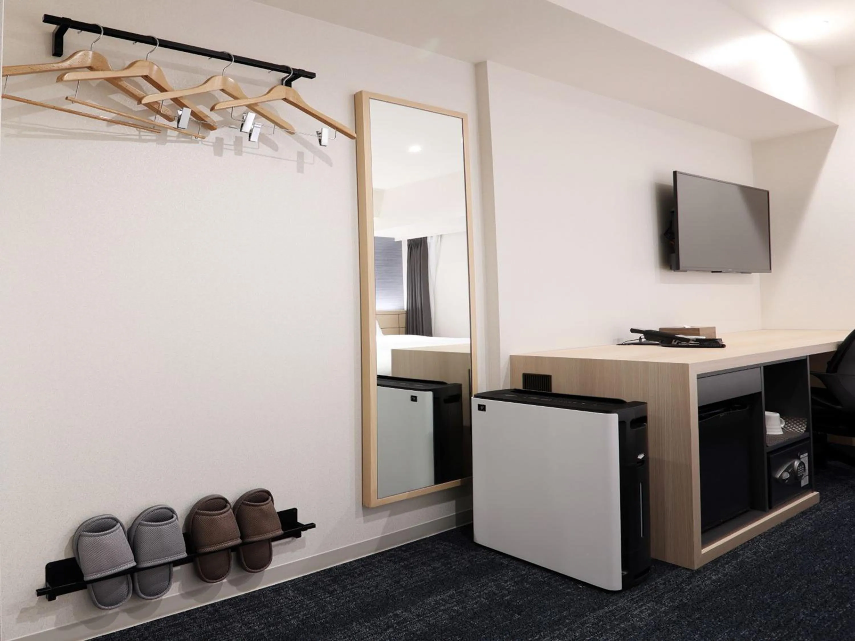 Photo of the whole room in Henn na Hotel Premier Nagoya Fushimiekimae