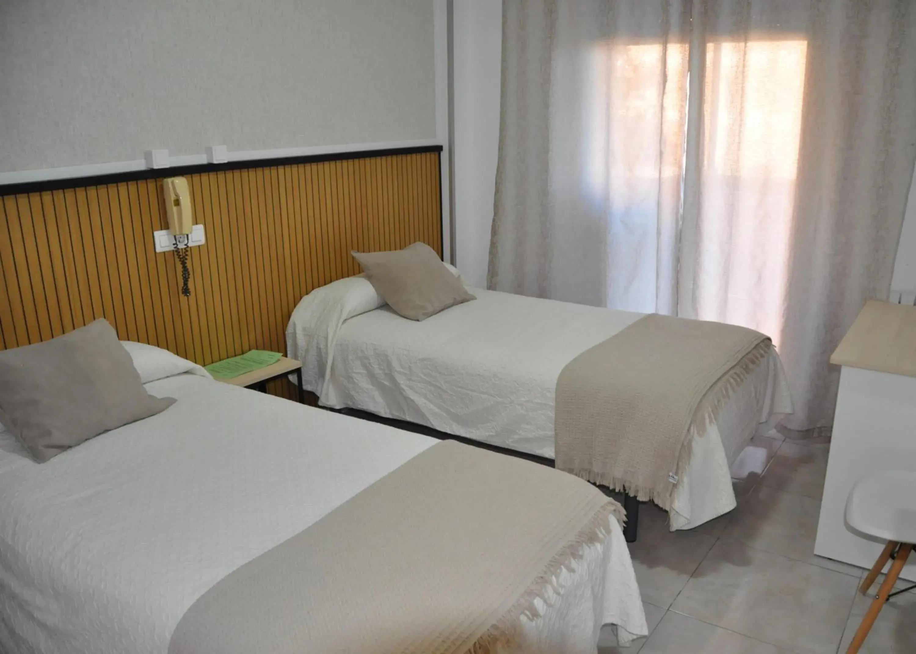 Twin Room with Shared Toilet in Hostal Ramón y Cajal Twin Room with Shared Toilet in Hostal Ramón y Cajal