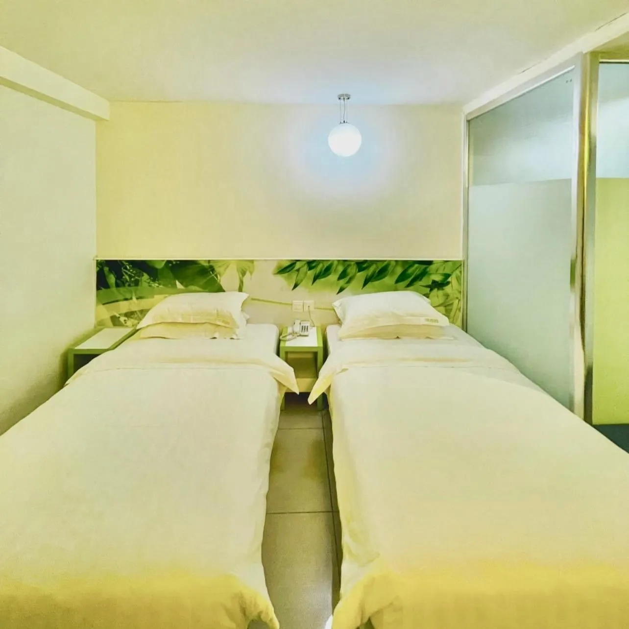 Bed in Green Apple Boutique Hotel