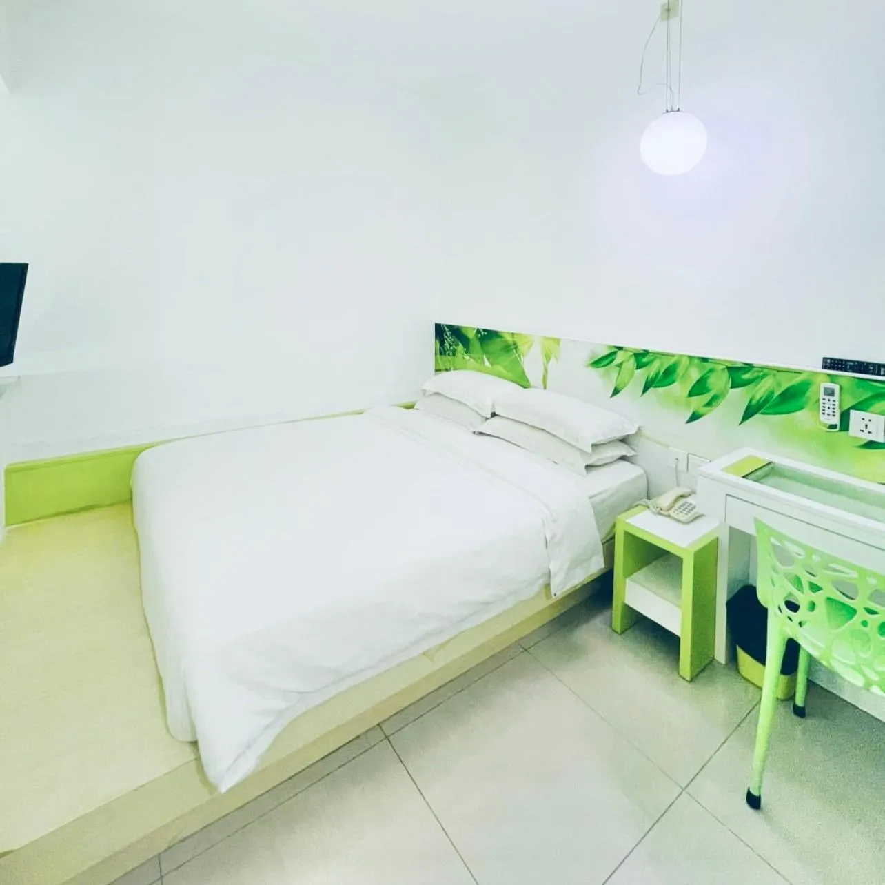 Bed in Green Apple Boutique Hotel