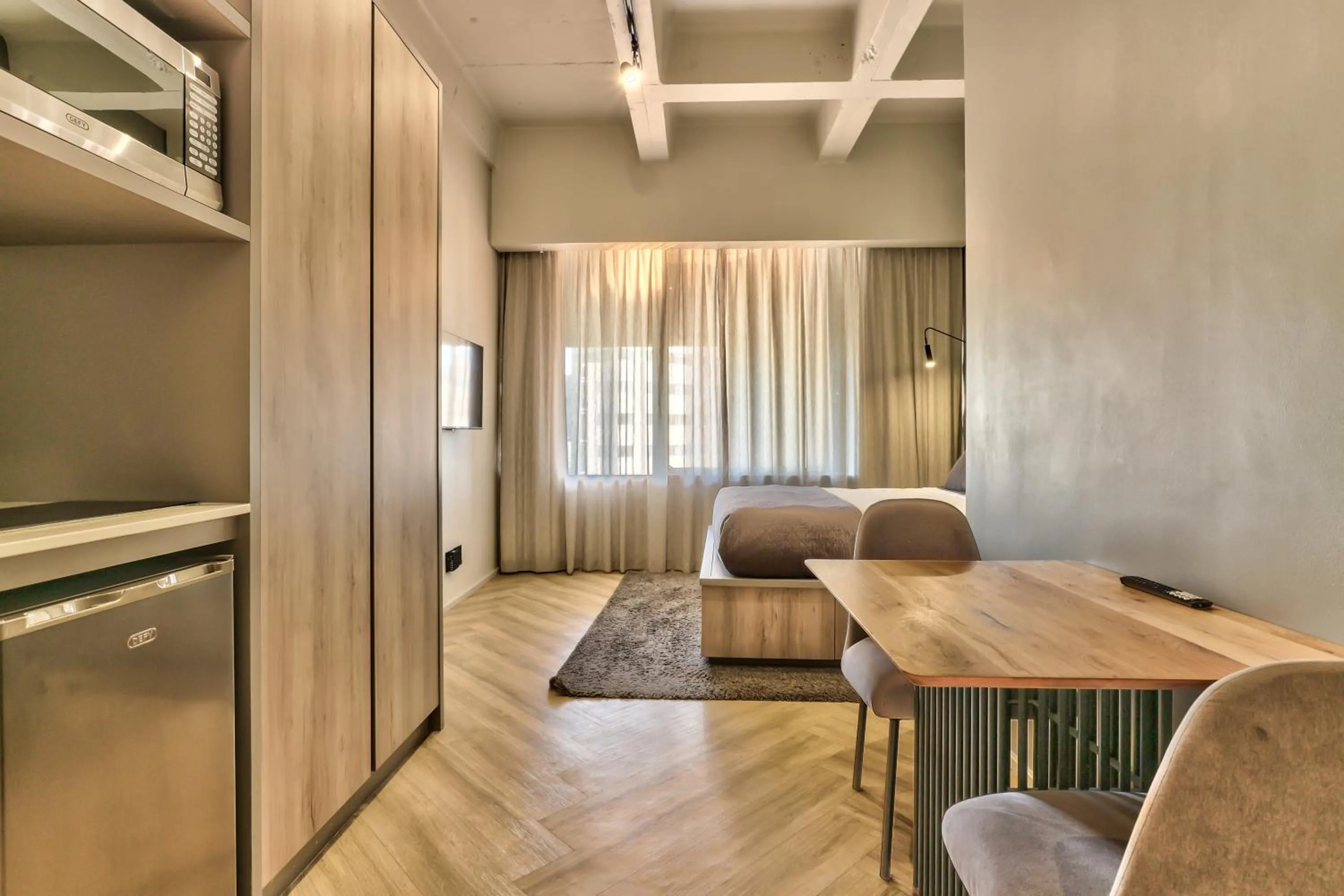 TV and multimedia in WINK Aparthotel One Thibault