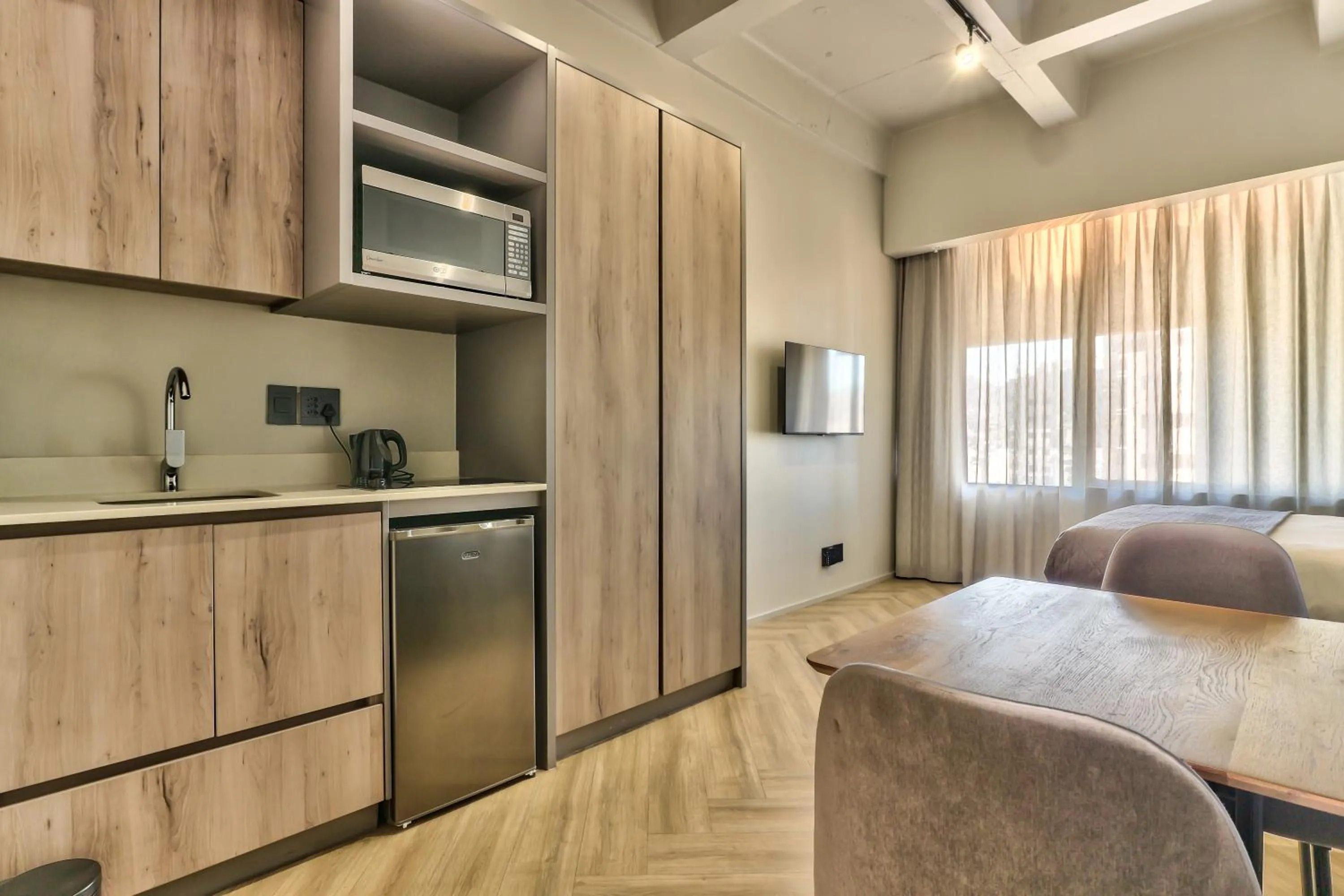 TV and multimedia in WINK Aparthotel One Thibault