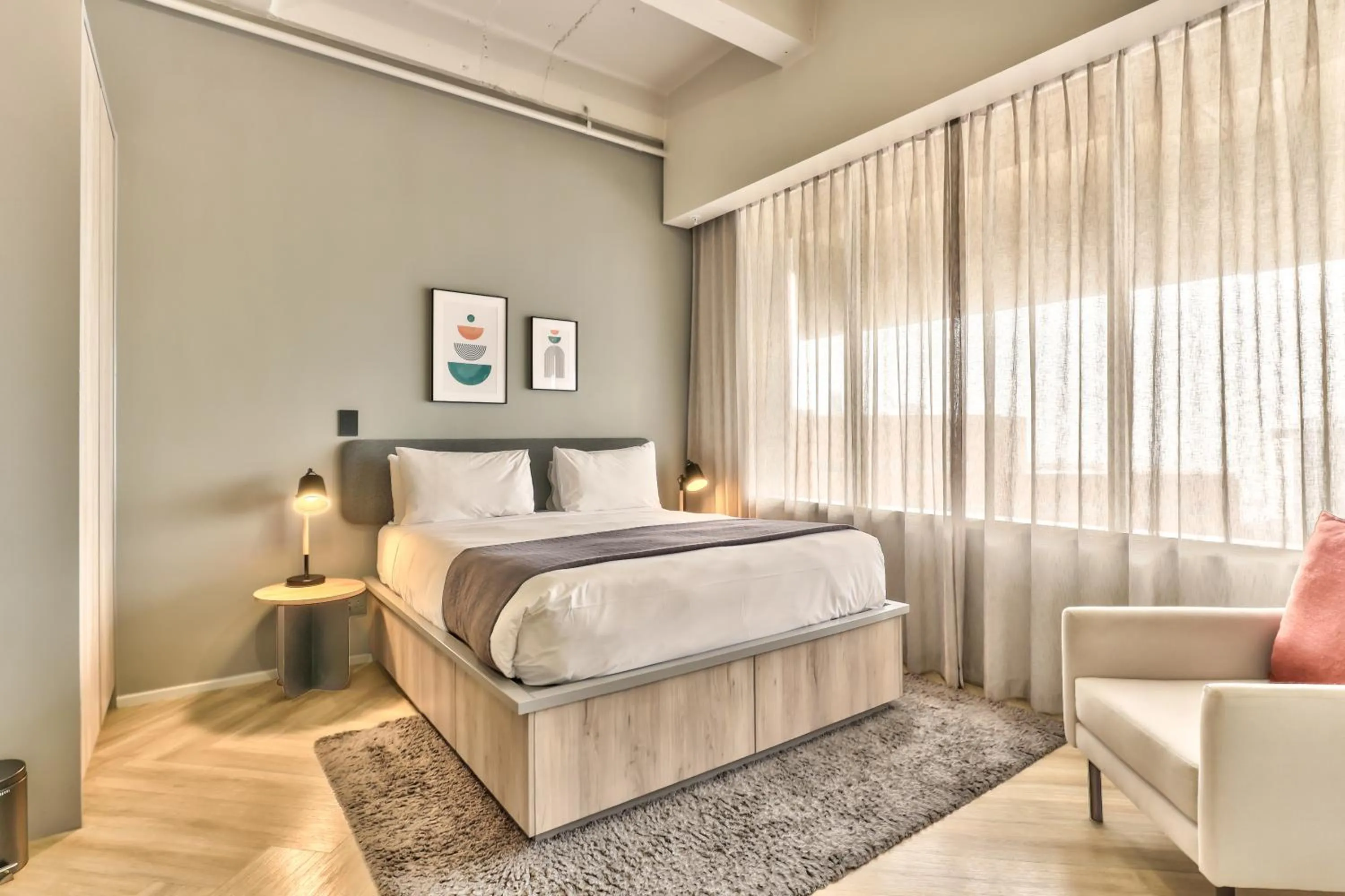 Bed in WINK Aparthotel One Thibault