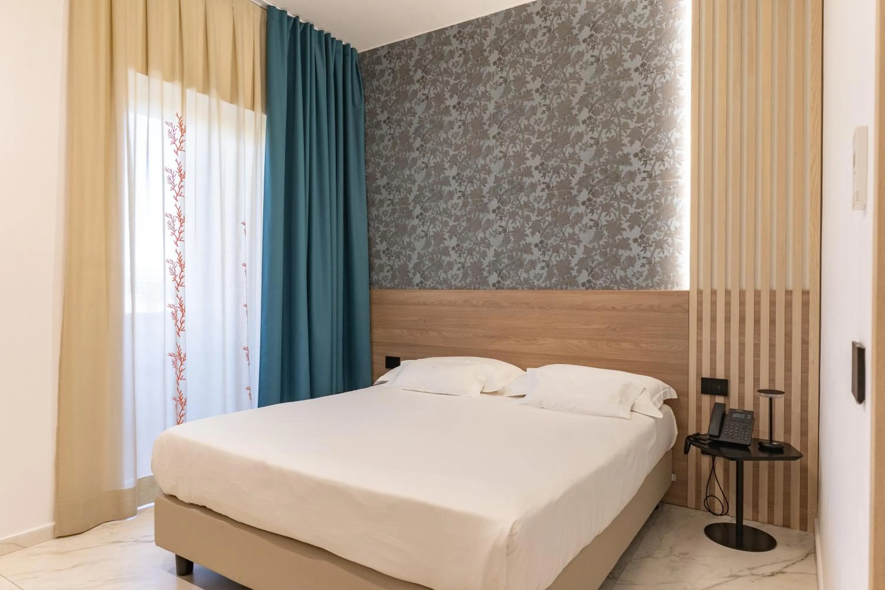 Bed in Hotel Maiuri Pompei