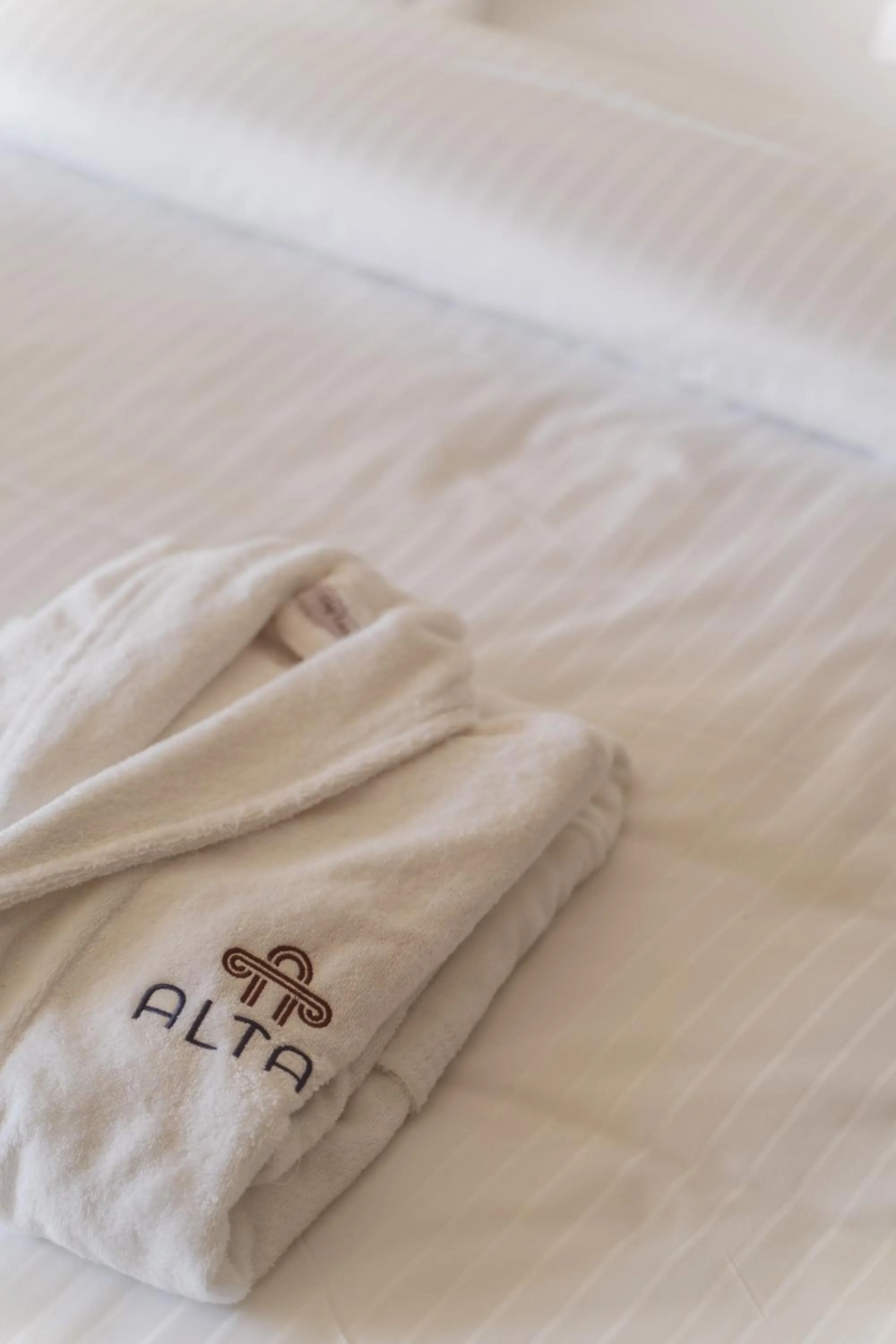 towels, Bed in Altar Suites