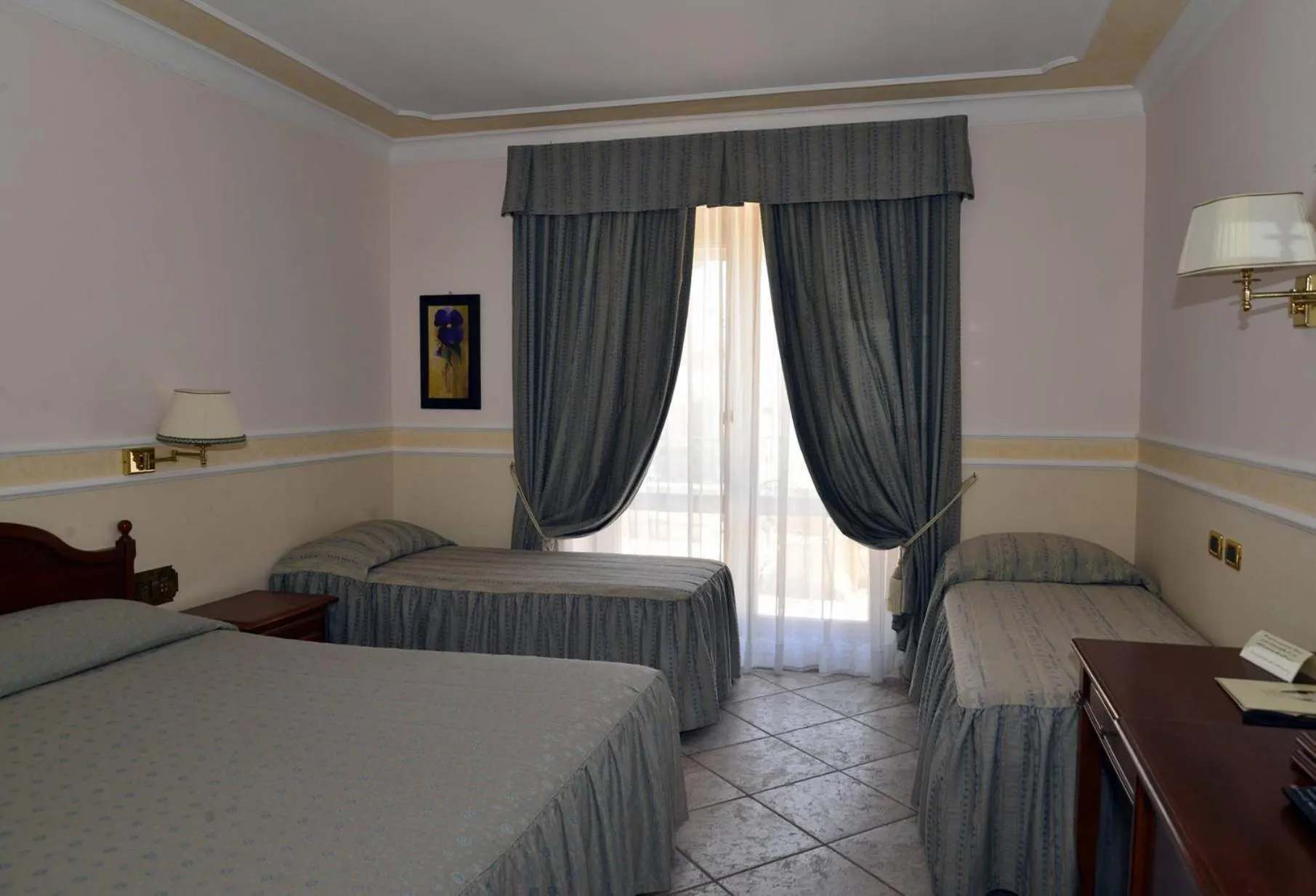 Bed in Afrodite Boutique Hotel