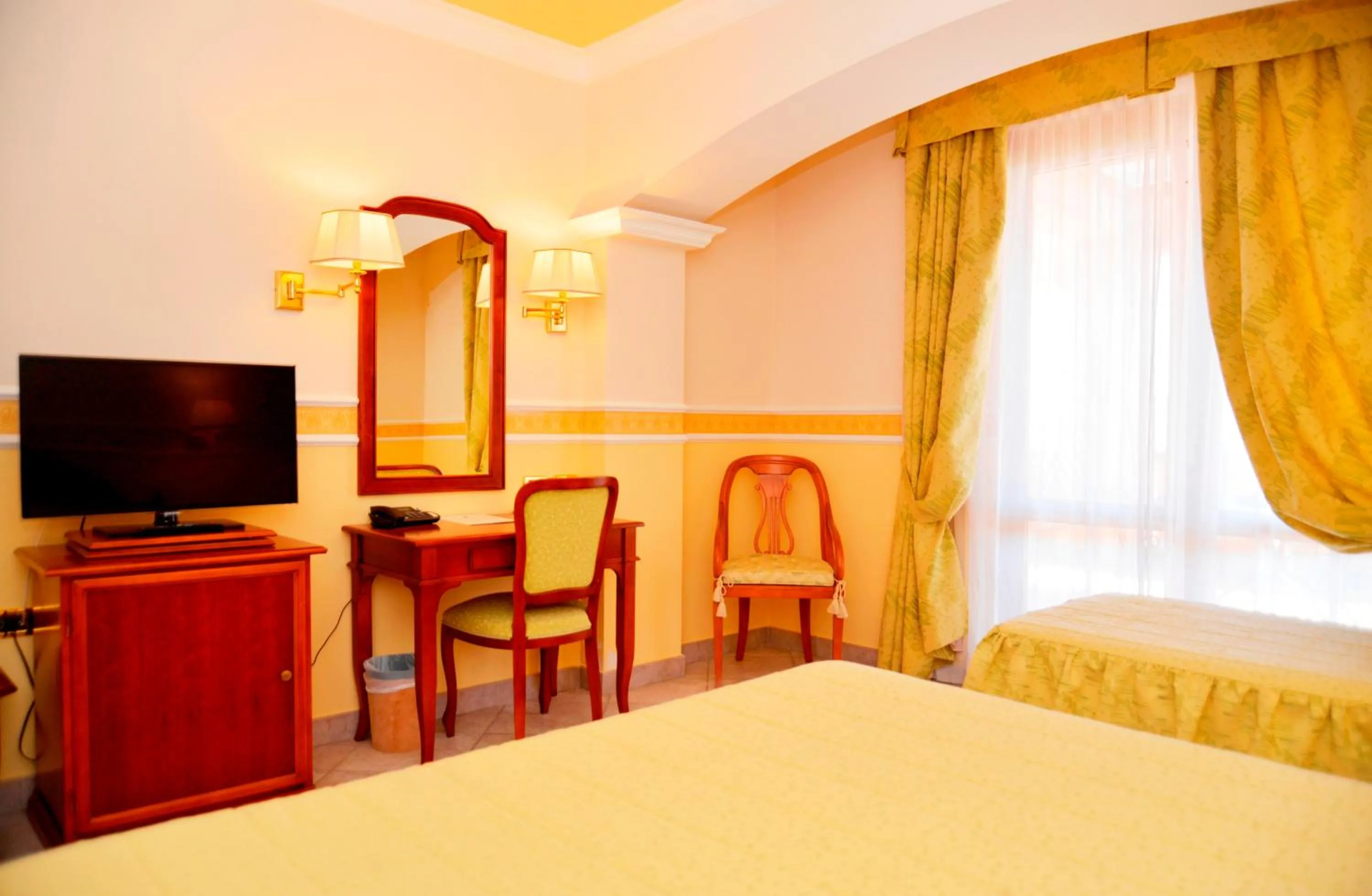 Seating area, Bed in Afrodite Boutique Hotel