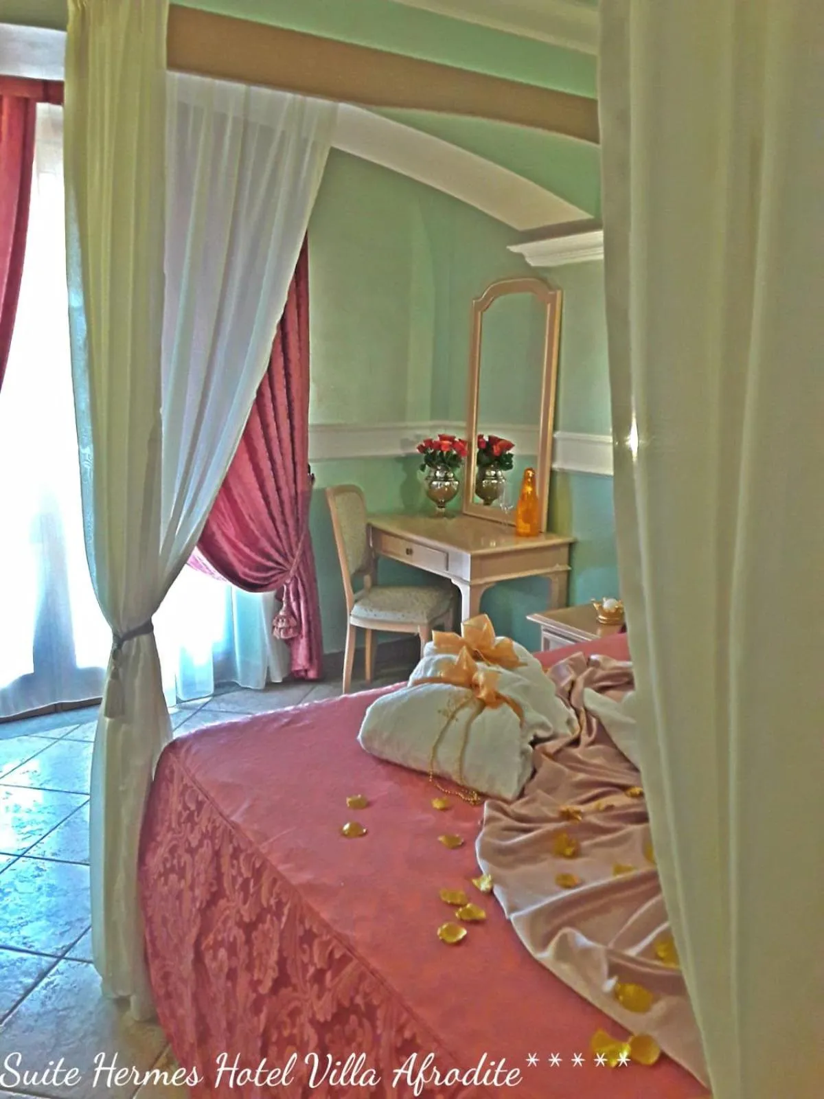 Bed in Afrodite Boutique Hotel