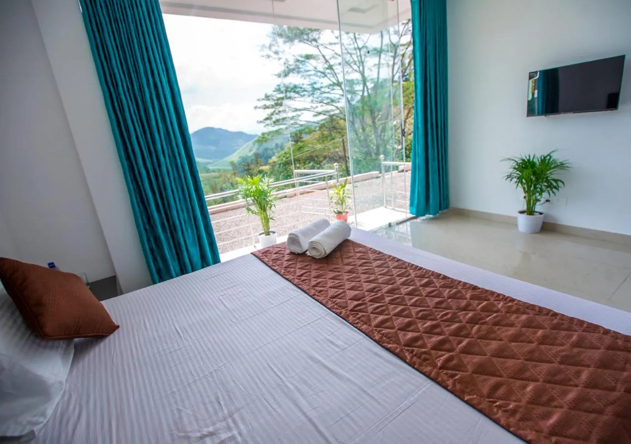 Bed in Hidden Valley Cottage Vagamon