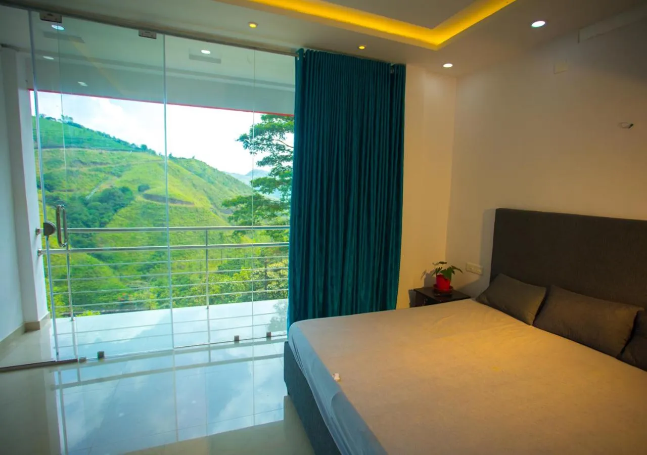 Bed in Hidden Valley Cottage Vagamon