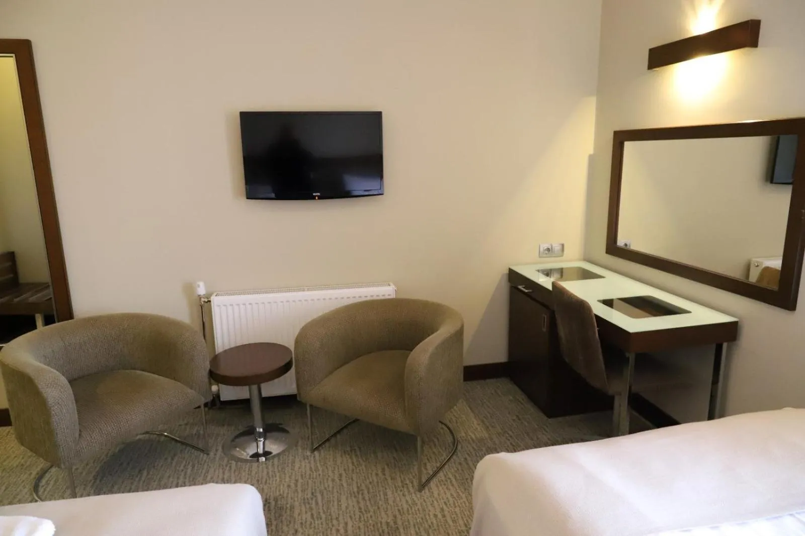 Seating area, Bed in HİTİT OTEL