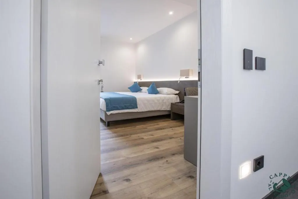 Bed in Albergo Cappello e Cadore