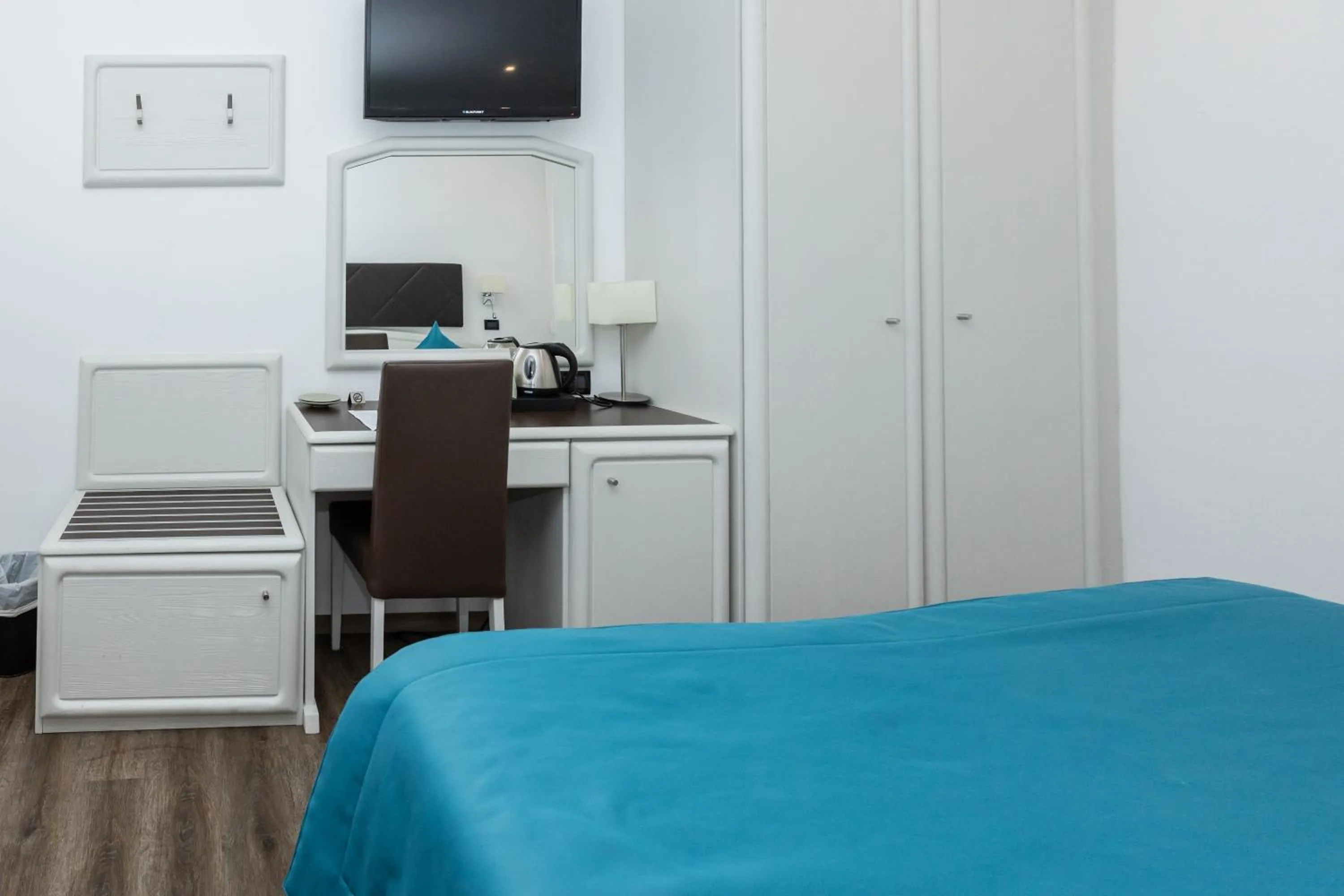 Bed in Albergo Cappello e Cadore