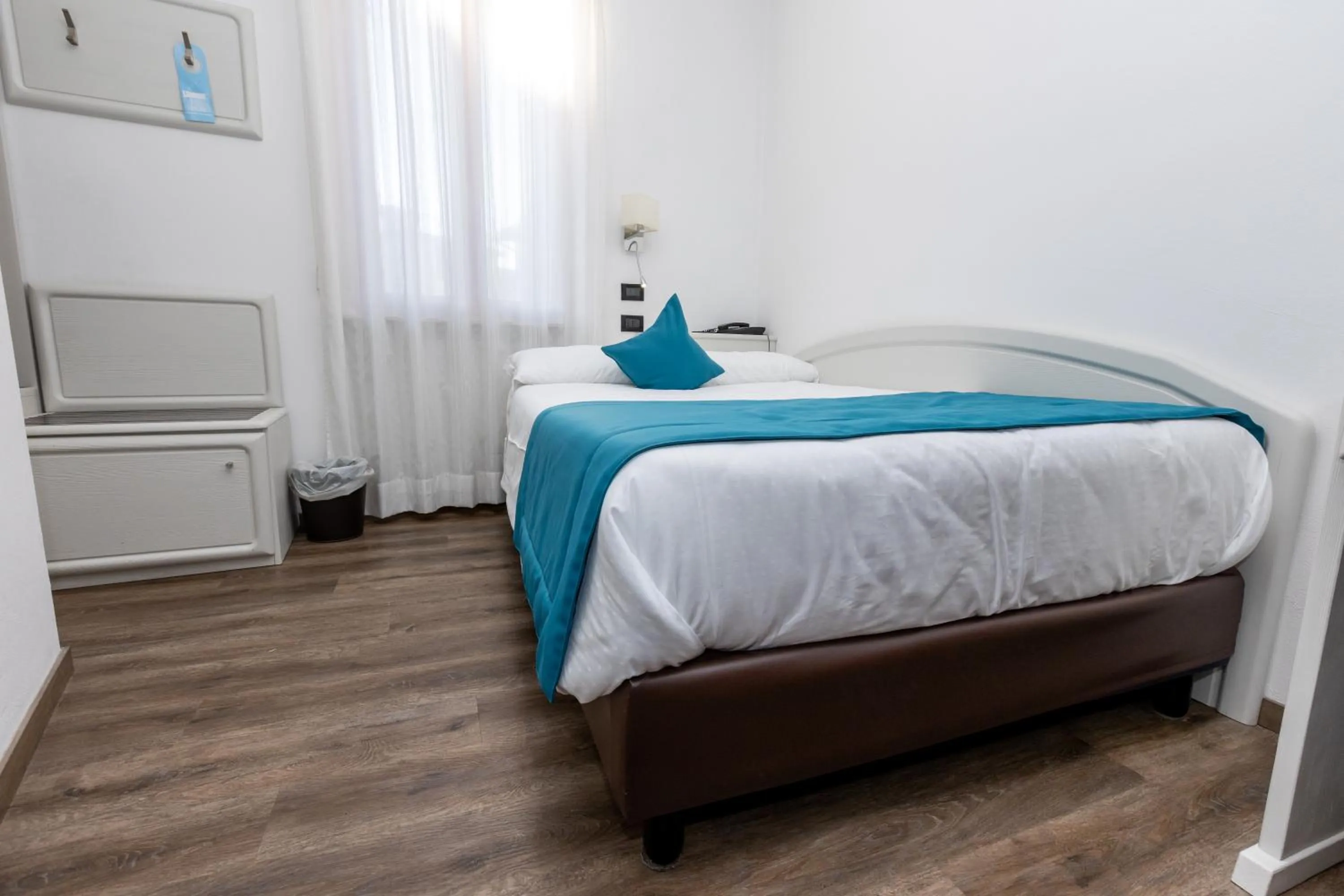 Bed in Albergo Cappello e Cadore