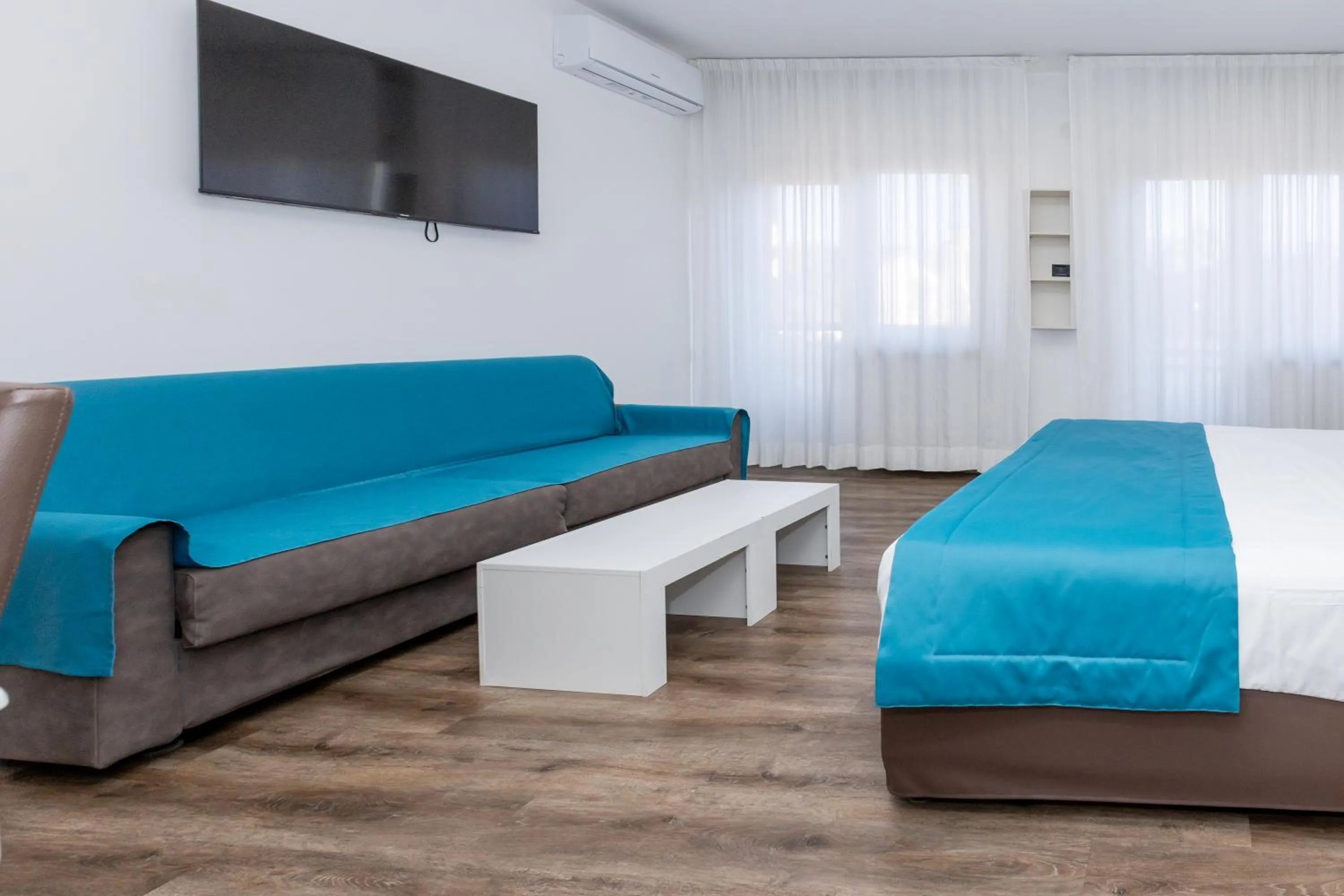 Bed in Albergo Cappello e Cadore