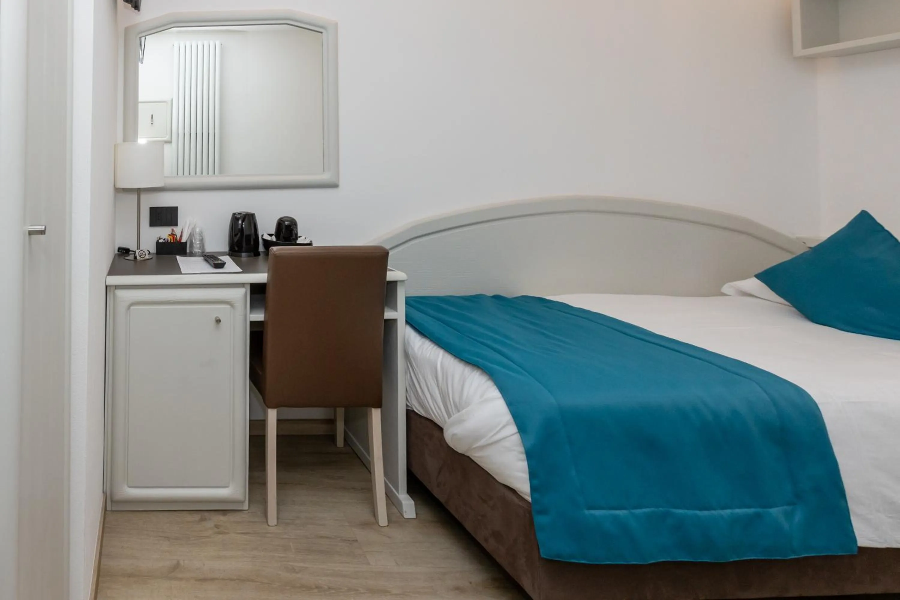 Bed in Albergo Cappello e Cadore