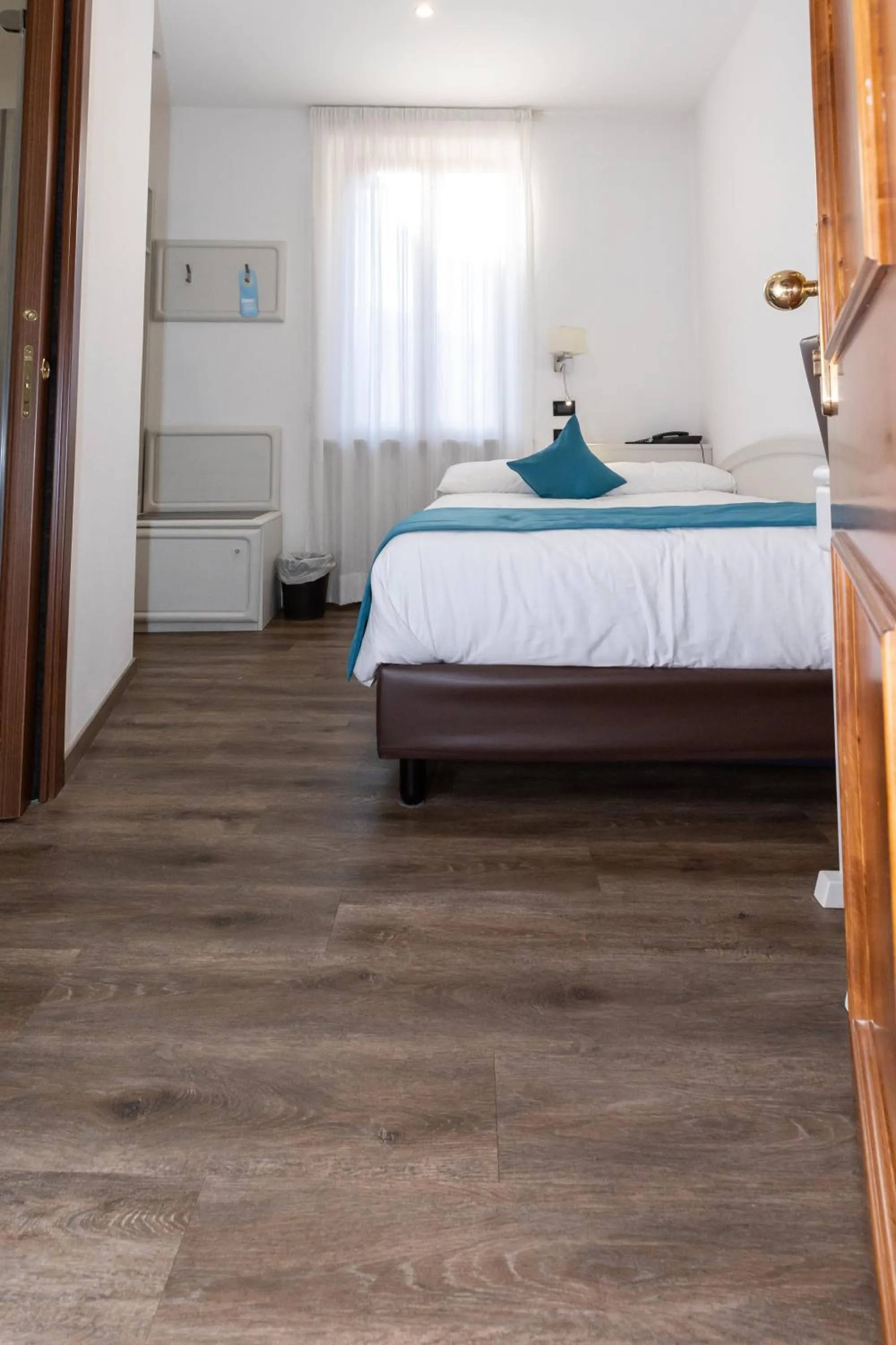 Bed in Albergo Cappello e Cadore