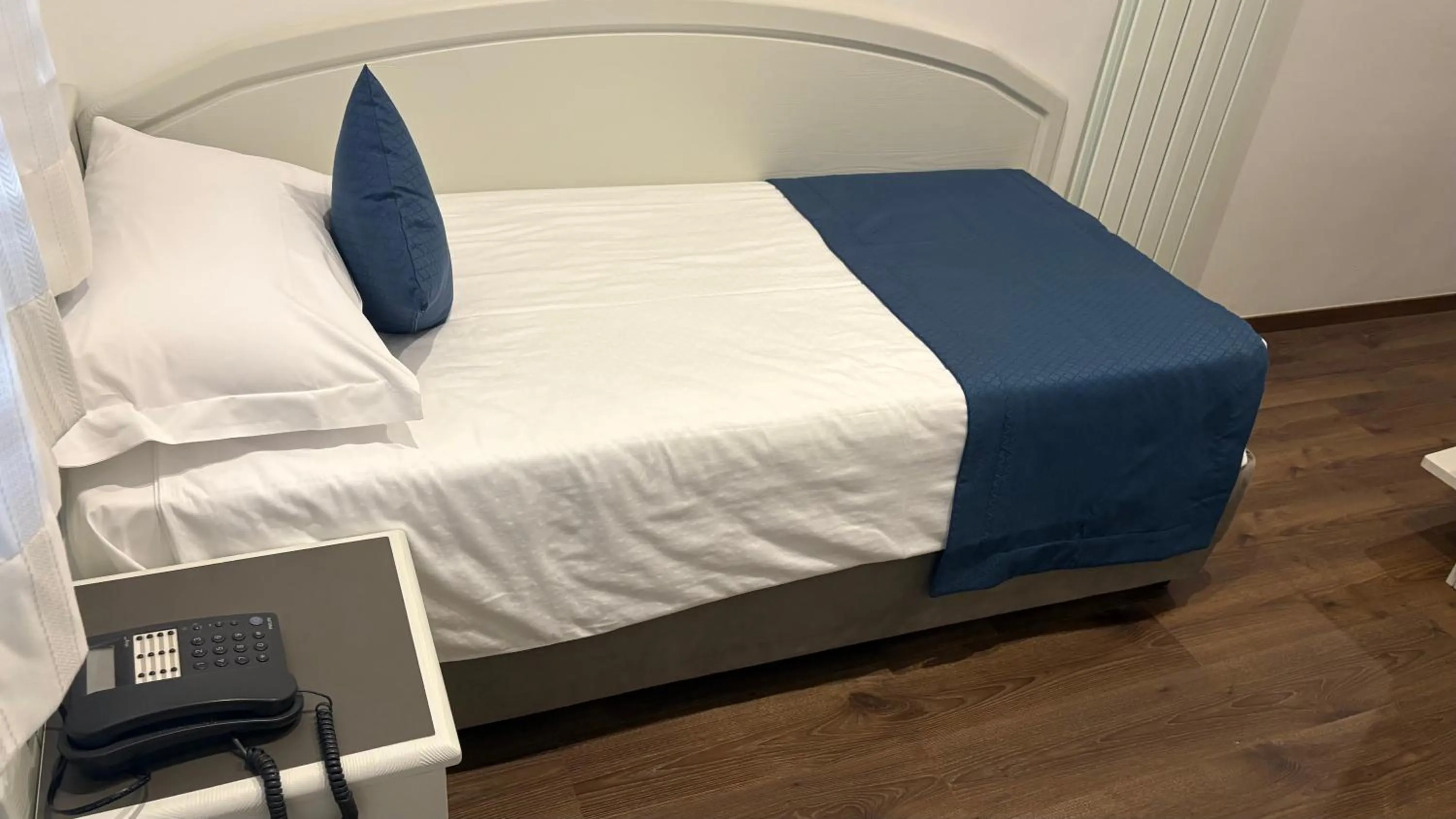Bed in Albergo Cappello e Cadore