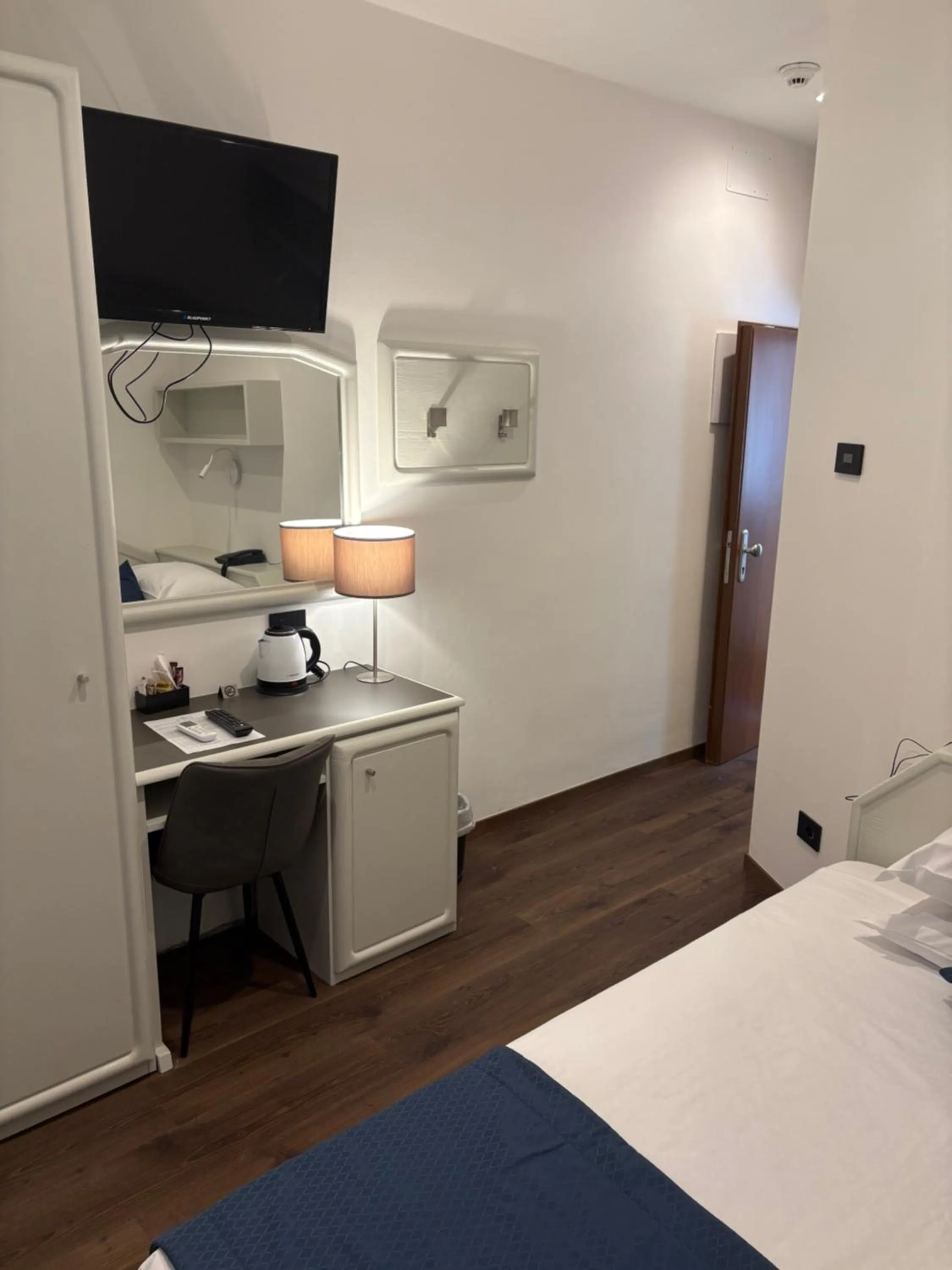 Bed in Albergo Cappello e Cadore