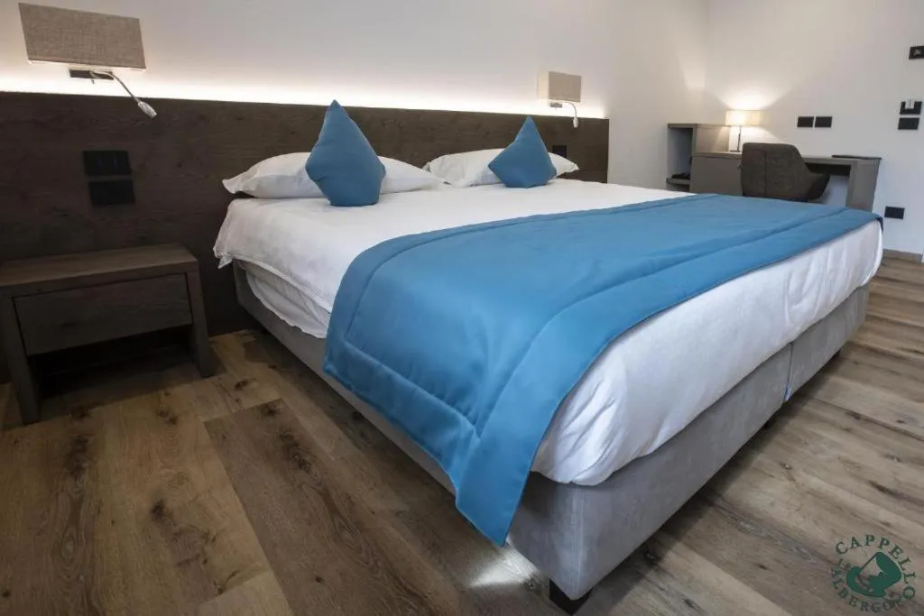 Bed in Albergo Cappello e Cadore