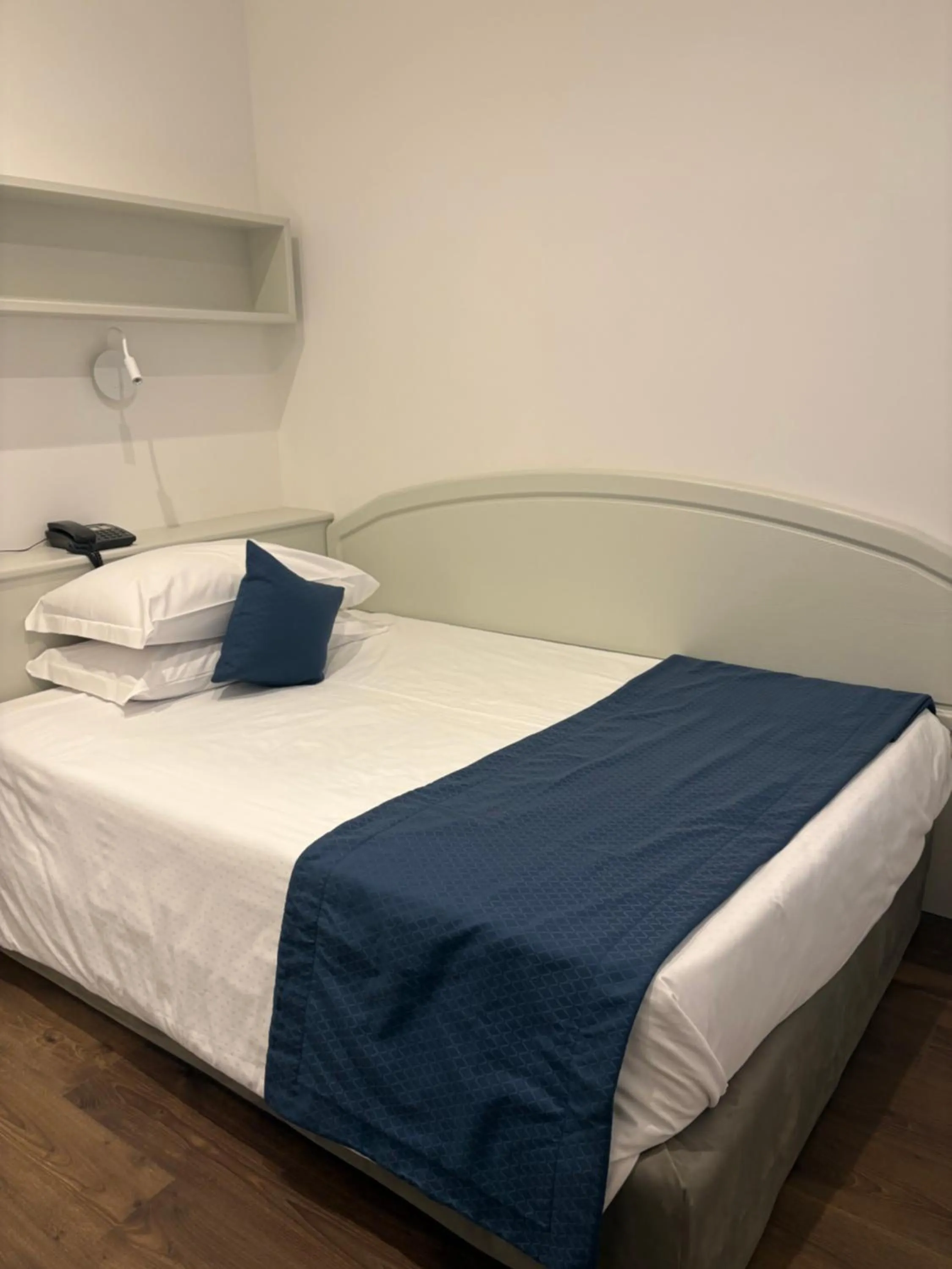 Bed in Albergo Cappello e Cadore