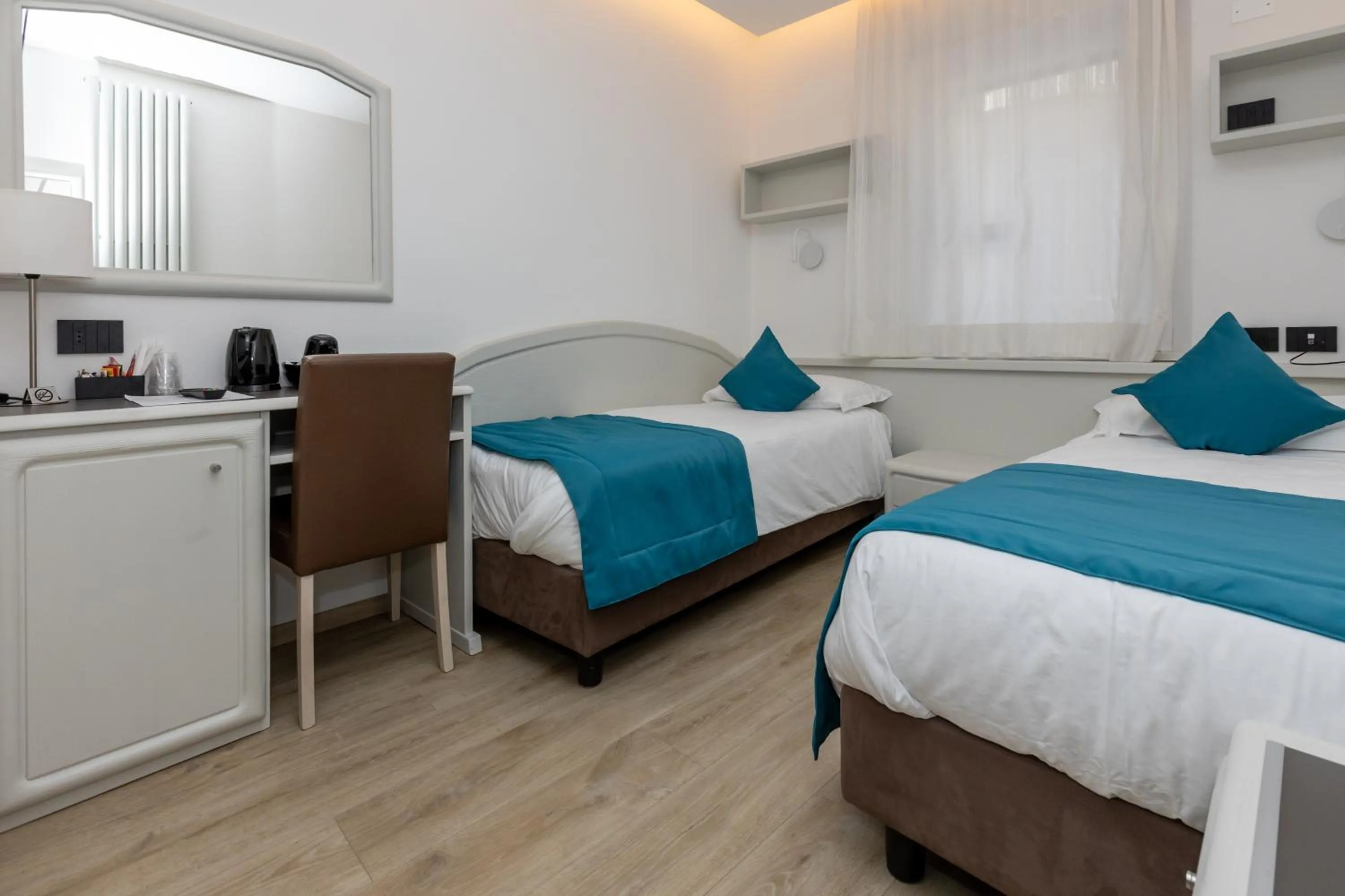 Bed in Albergo Cappello e Cadore