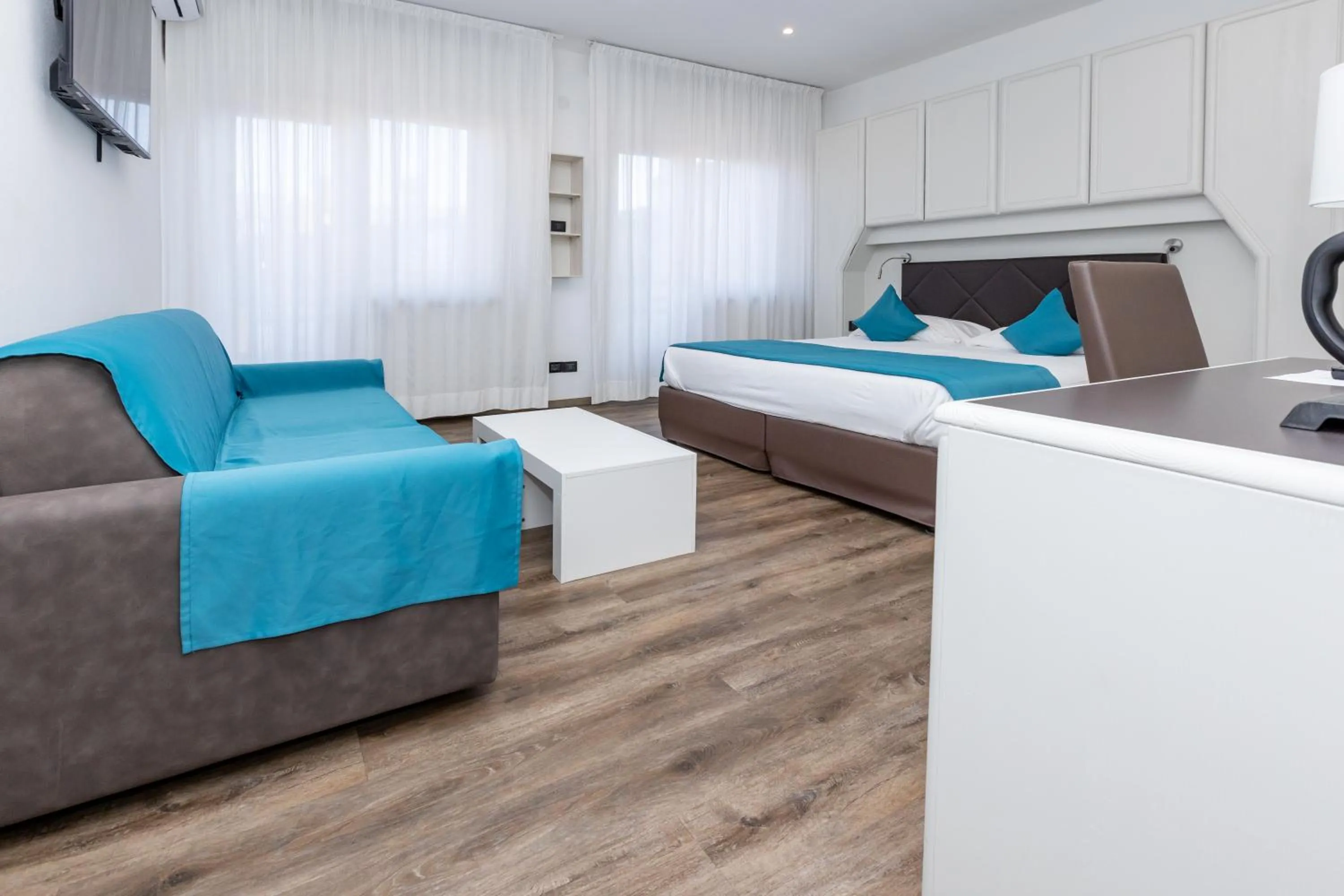 Bed in Albergo Cappello e Cadore