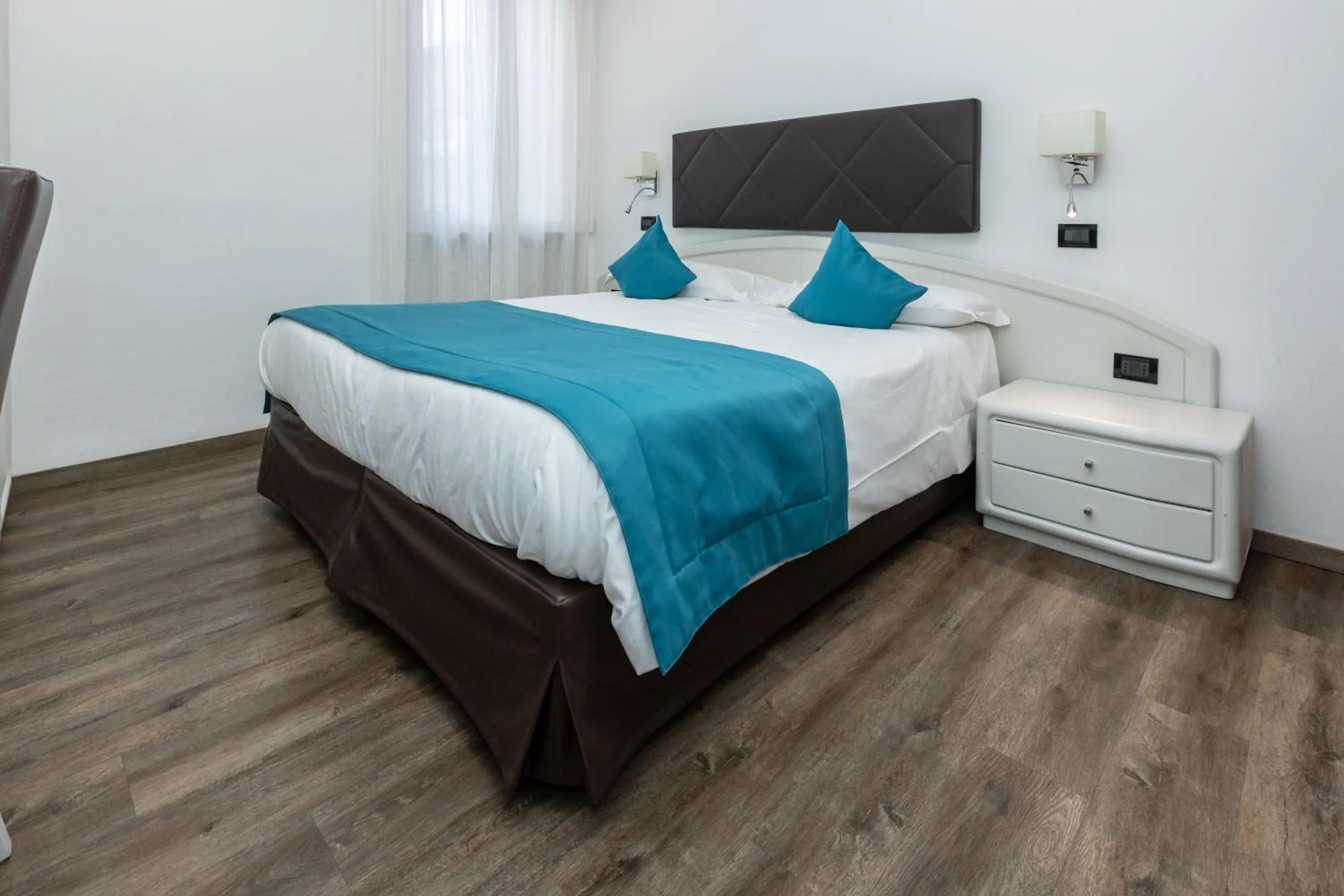 Bed in Albergo Cappello e Cadore