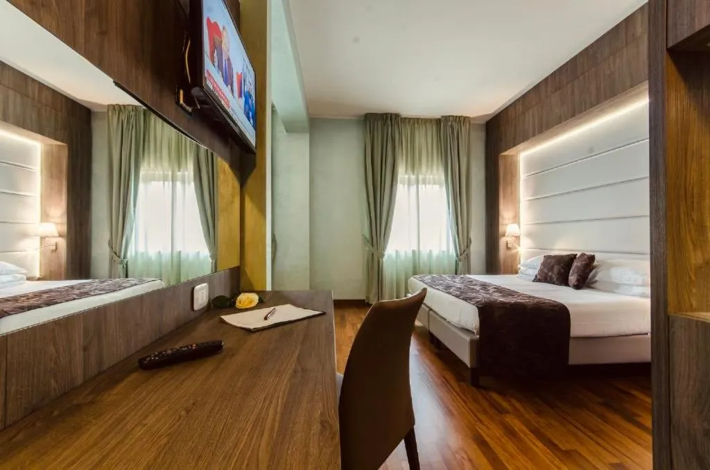 Bed in Hotel Santacroce Meeting