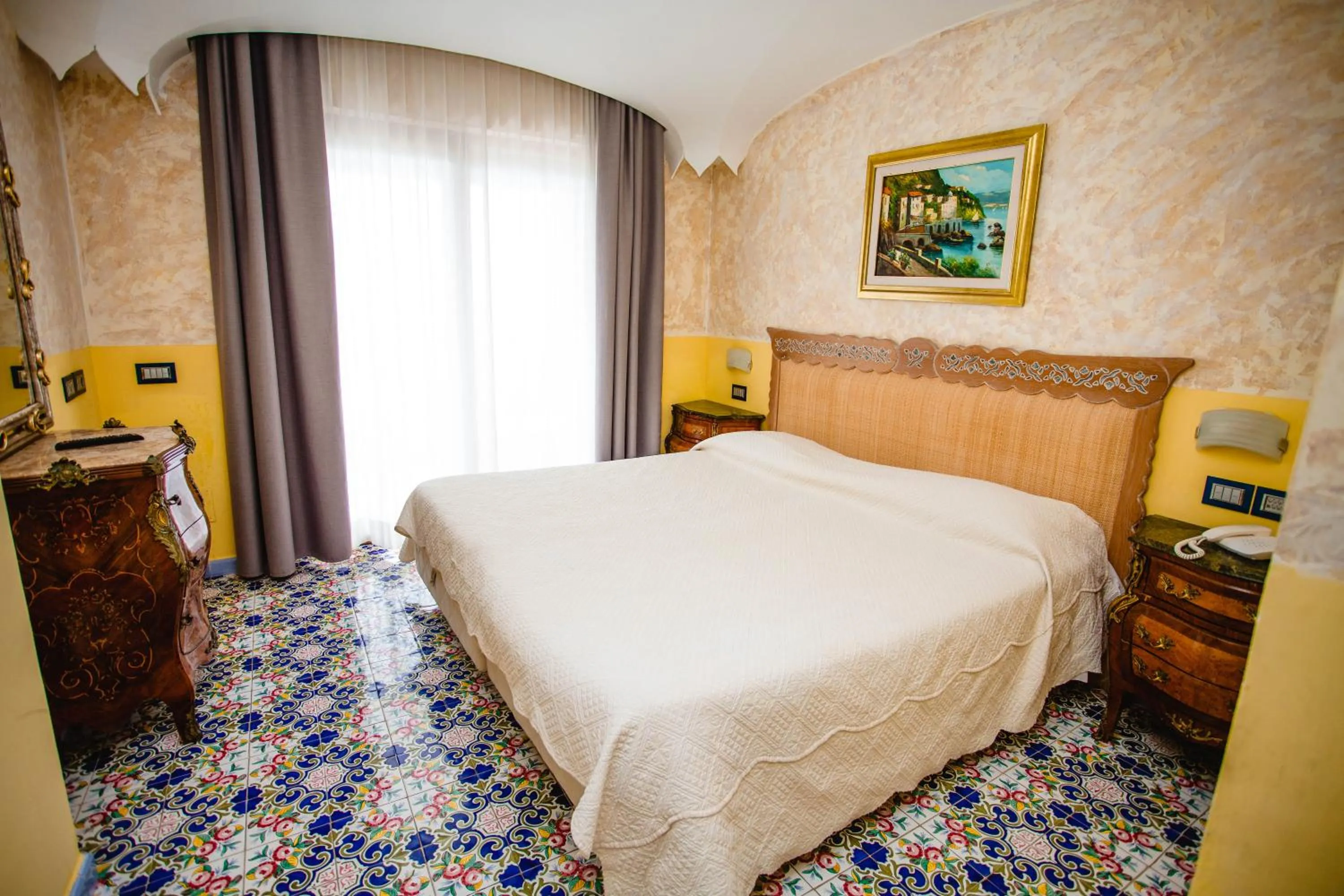 Bed in Strand Hotel Delfini