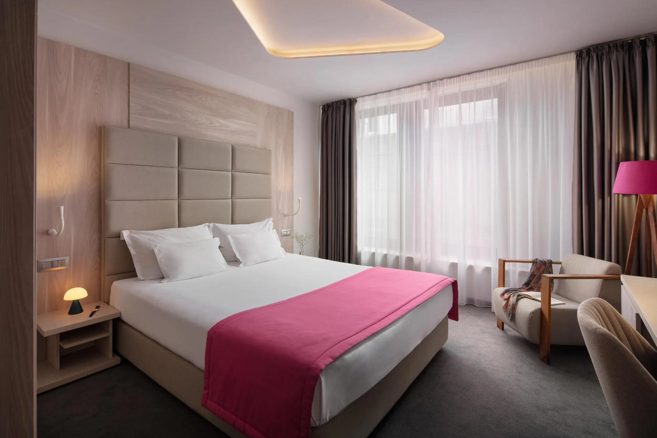 Bed in Hotel Colors Inn