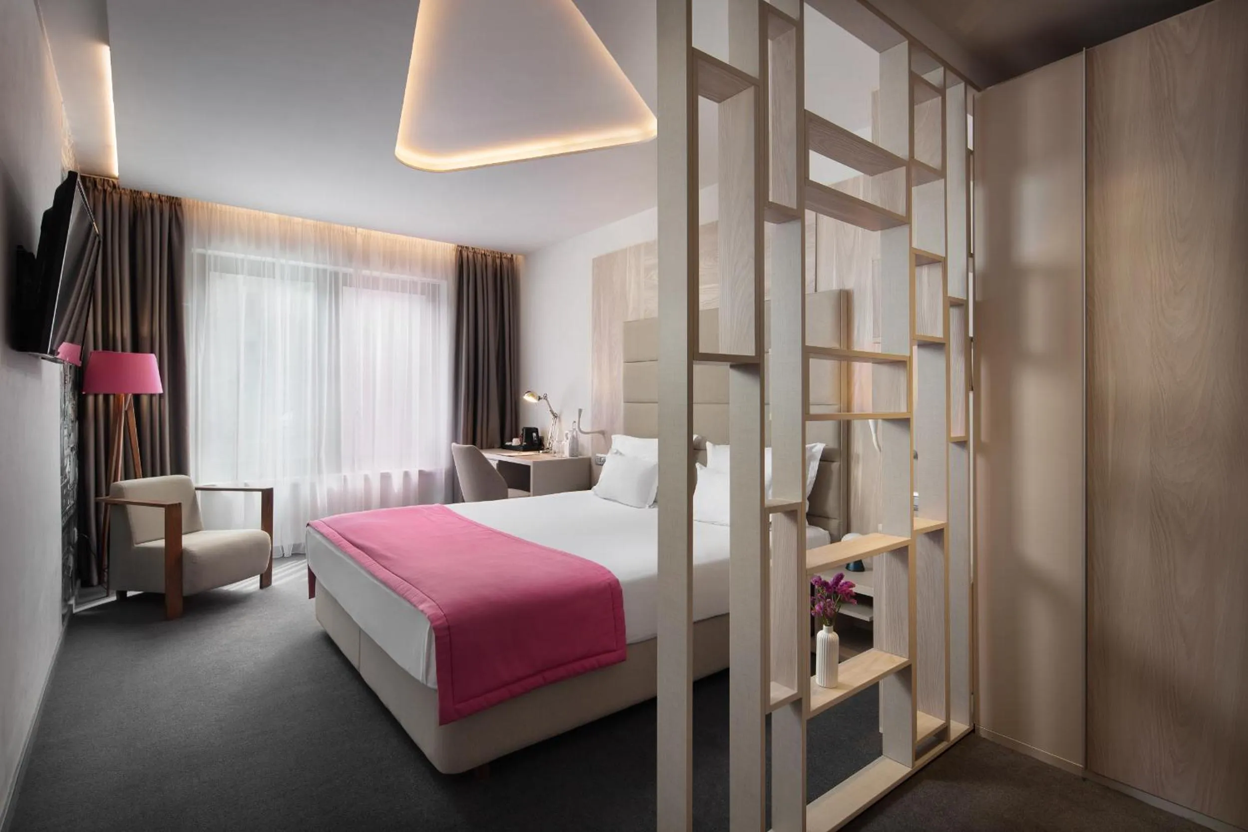 Bed in Hotel Colors Inn