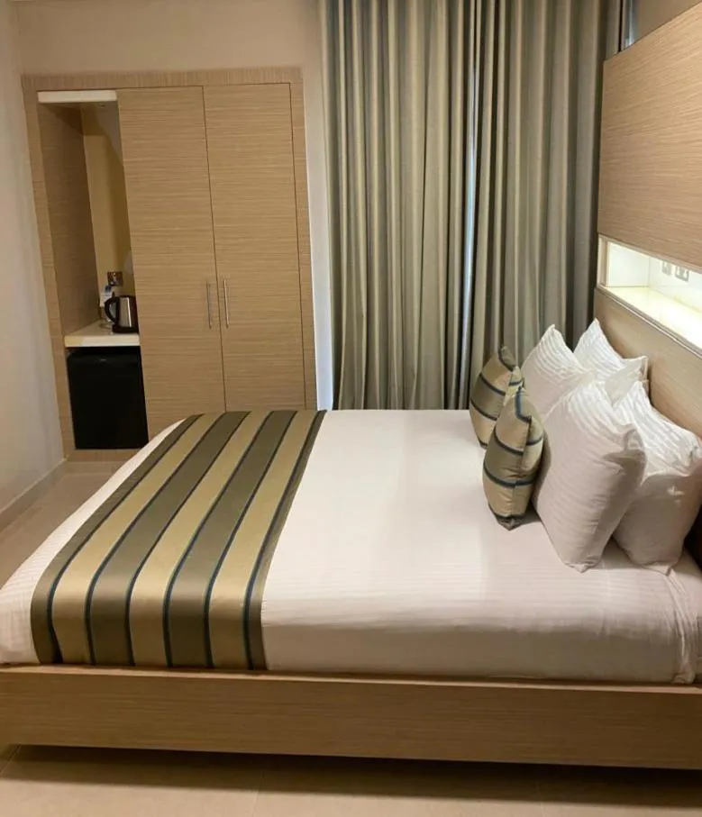 Bed in Home Suites Boutique Hotel Freetown