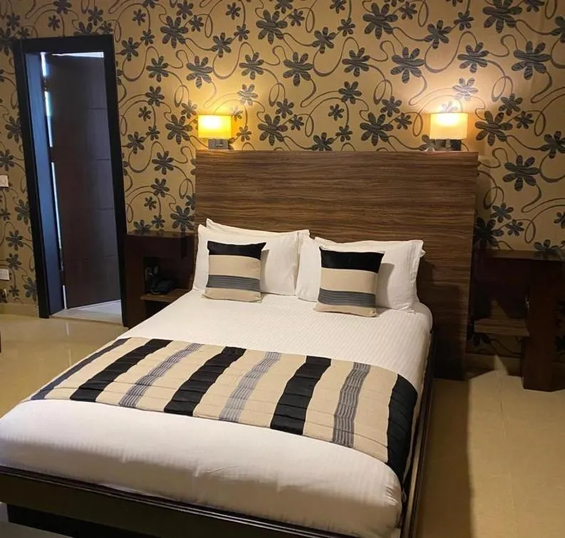Bed in Home Suites Boutique Hotel Freetown