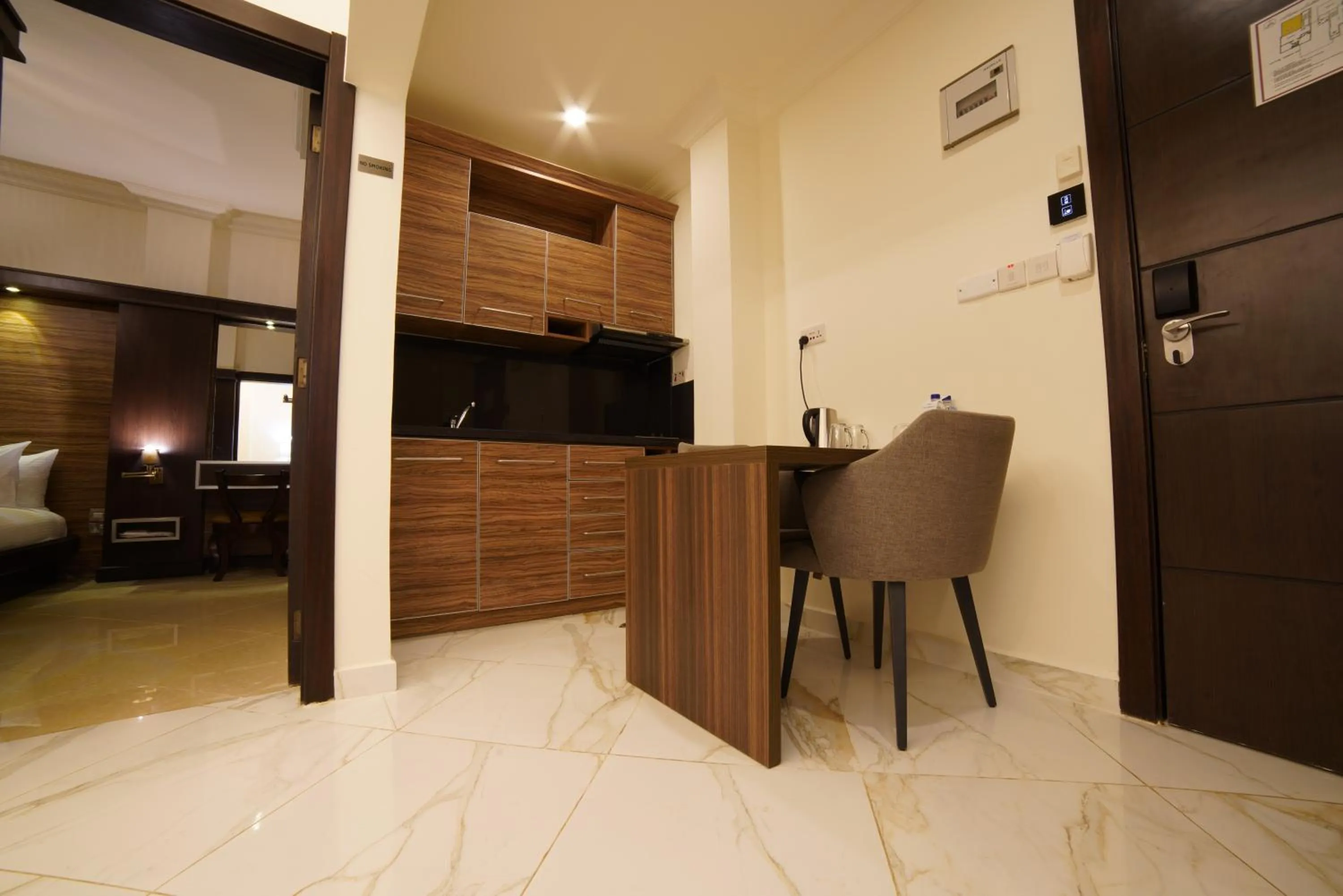 Kitchen or kitchenette in Home Suites Boutique Hotel Freetown