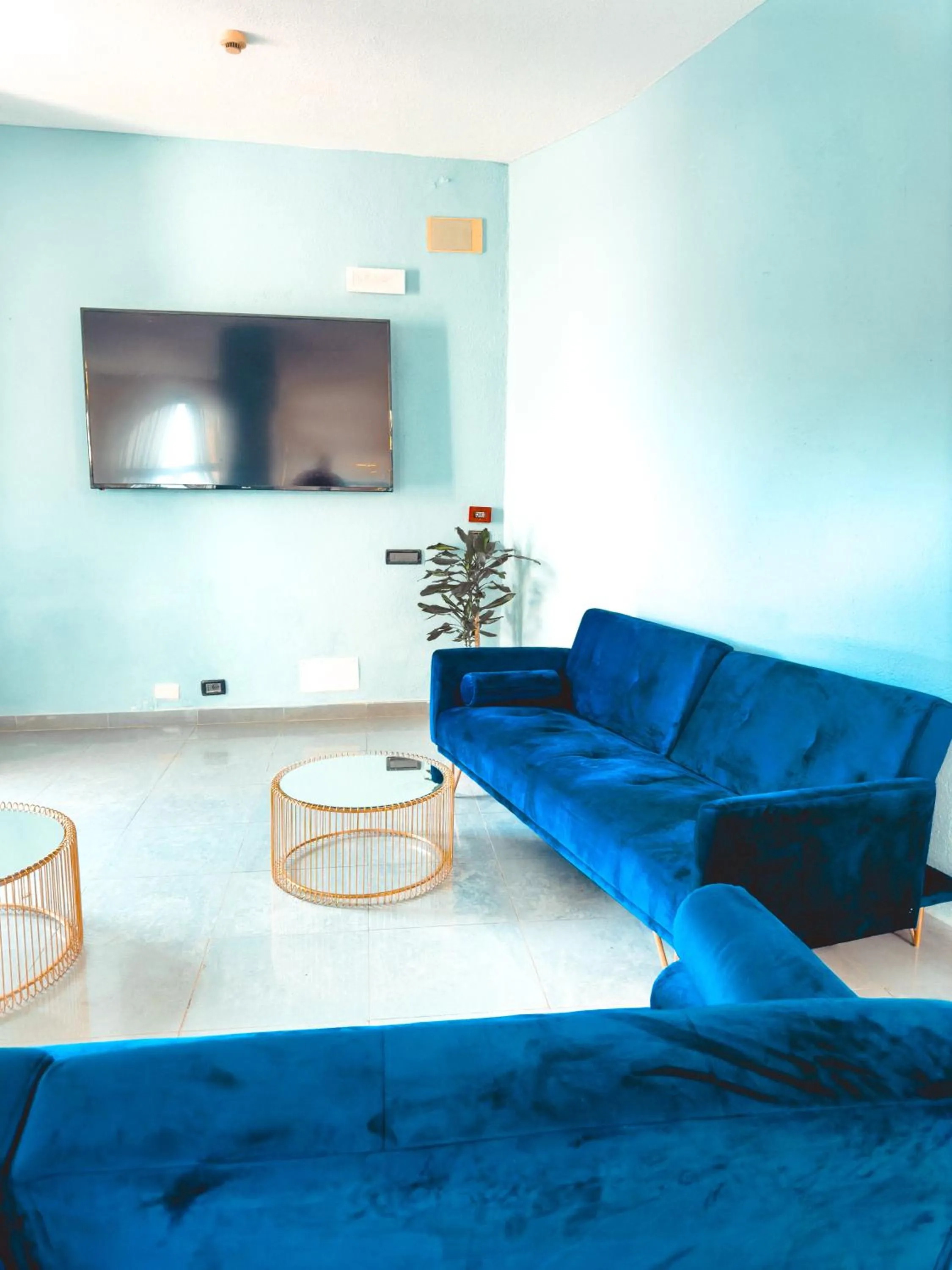 Communal lounge/ TV room in Parco dei Principi Resort & Spa