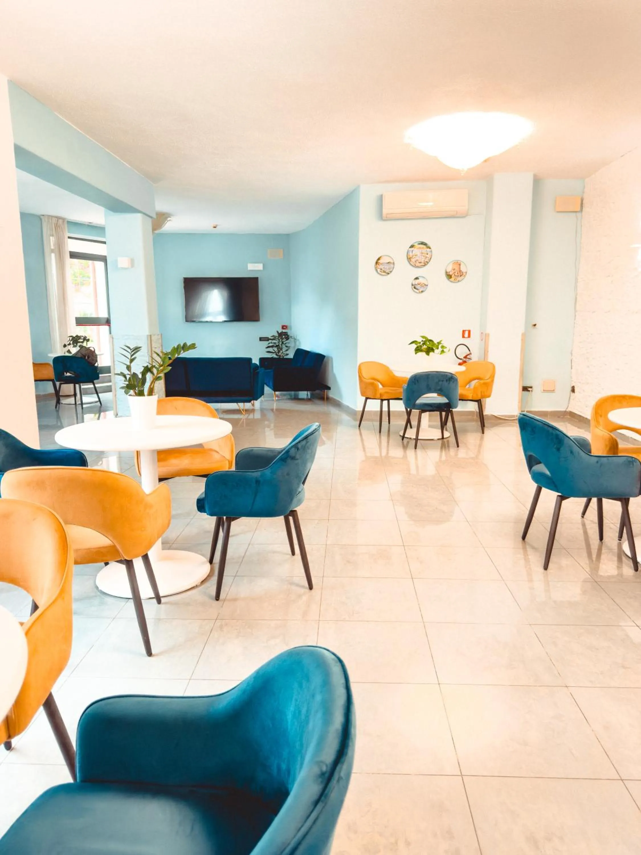 Communal lounge/ TV room in Parco dei Principi Resort & Spa