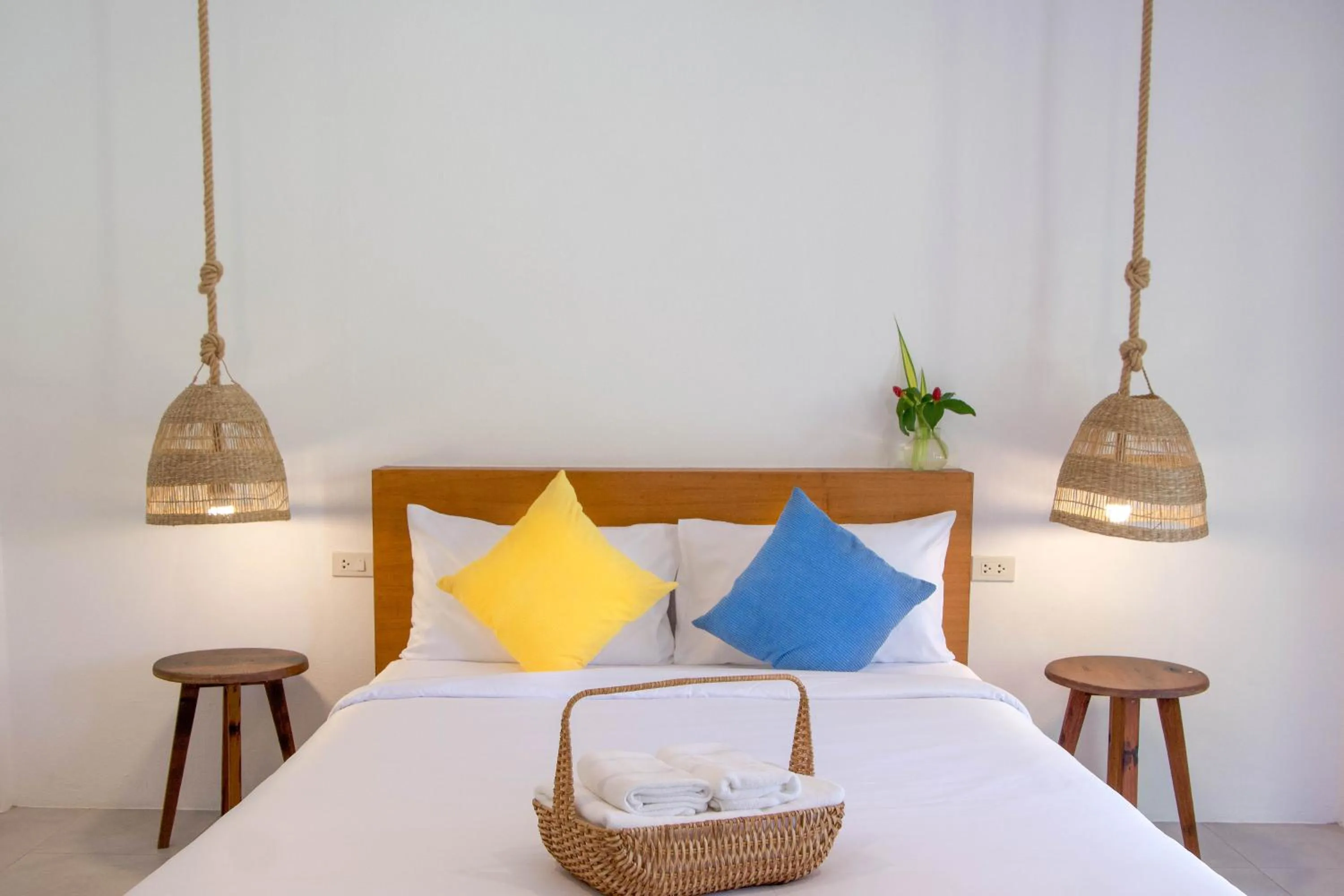 Bed in Issara Beach Resort Beachfront