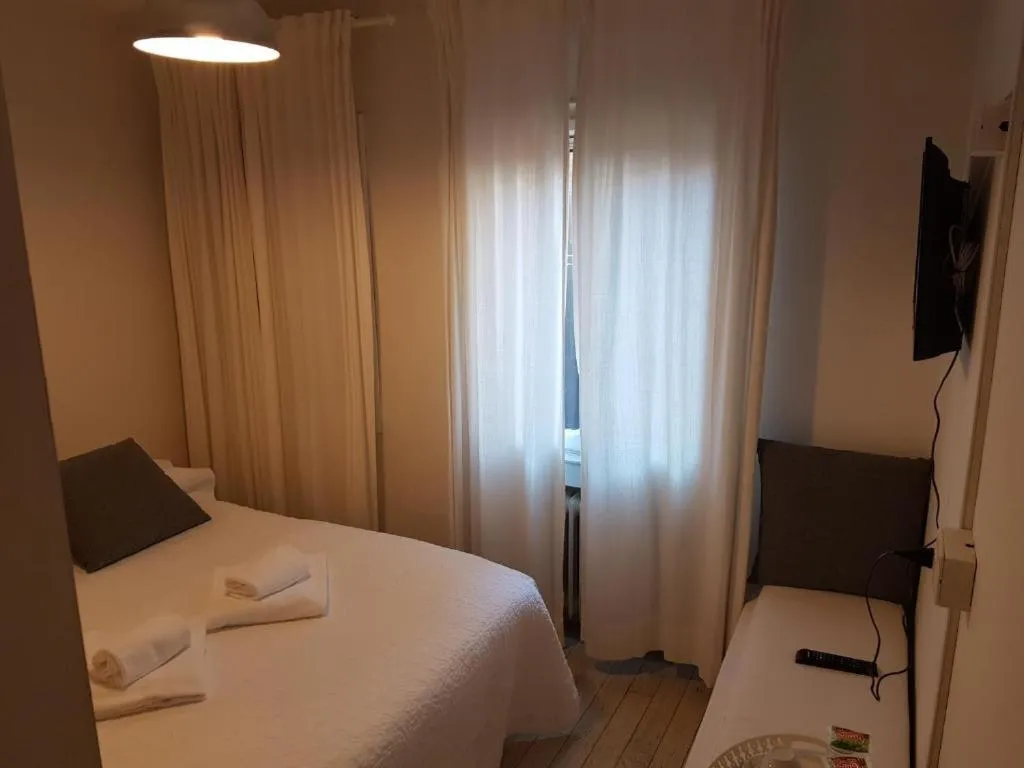 Bed in Al Portico Guest House