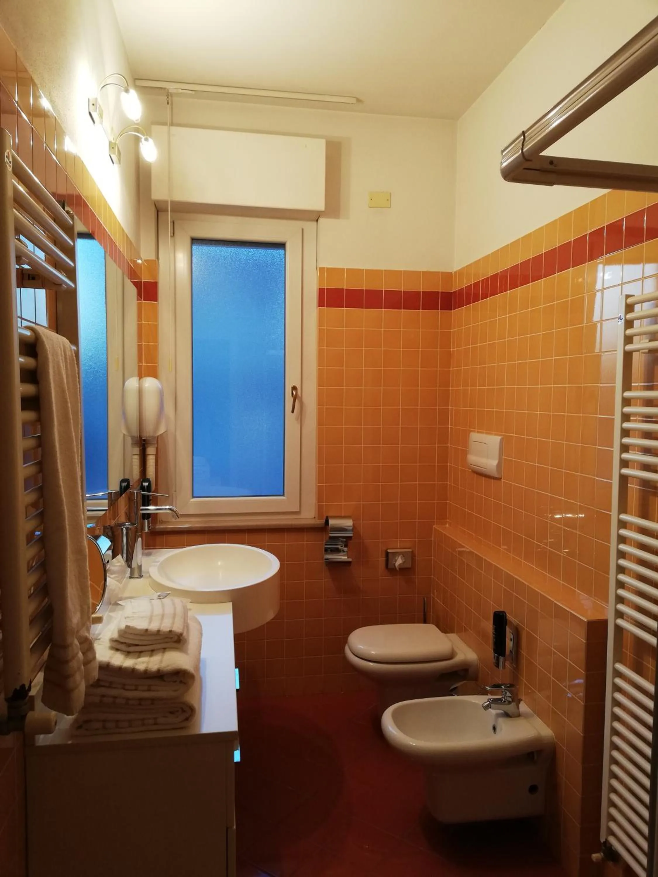 Toilet in Hotel Clarin 14 by Dori