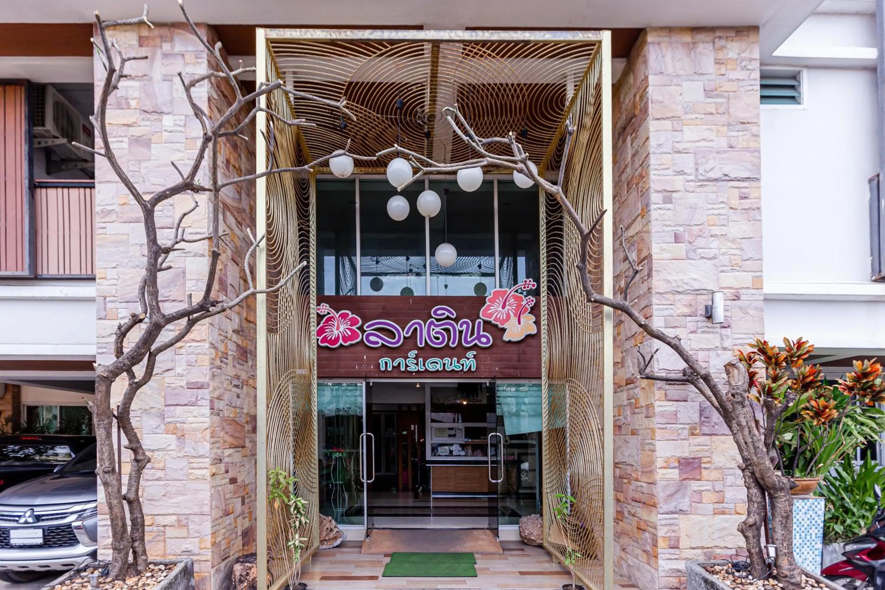 Property building in Latin Garden Hotel