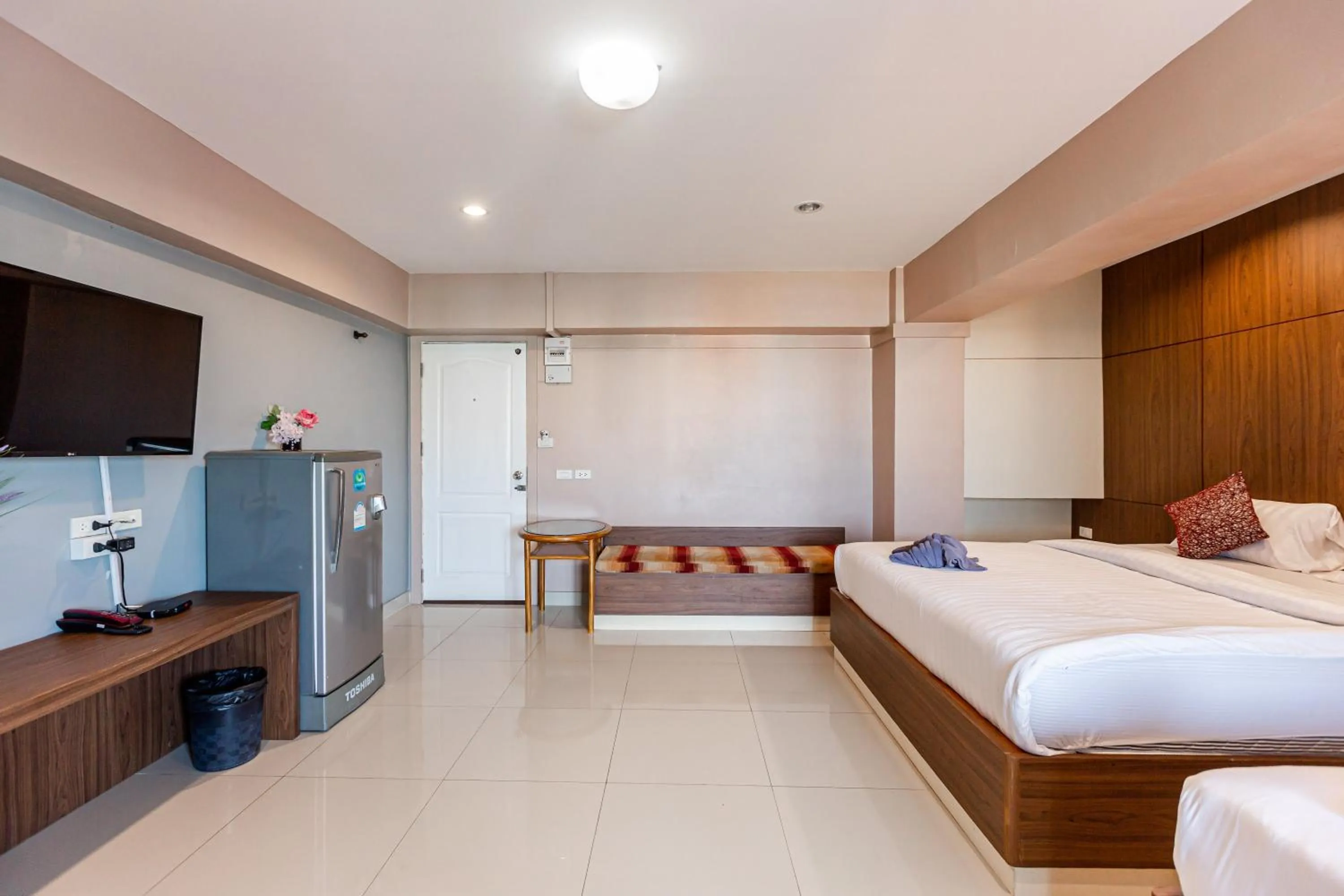 Bed in Latin Garden Hotel