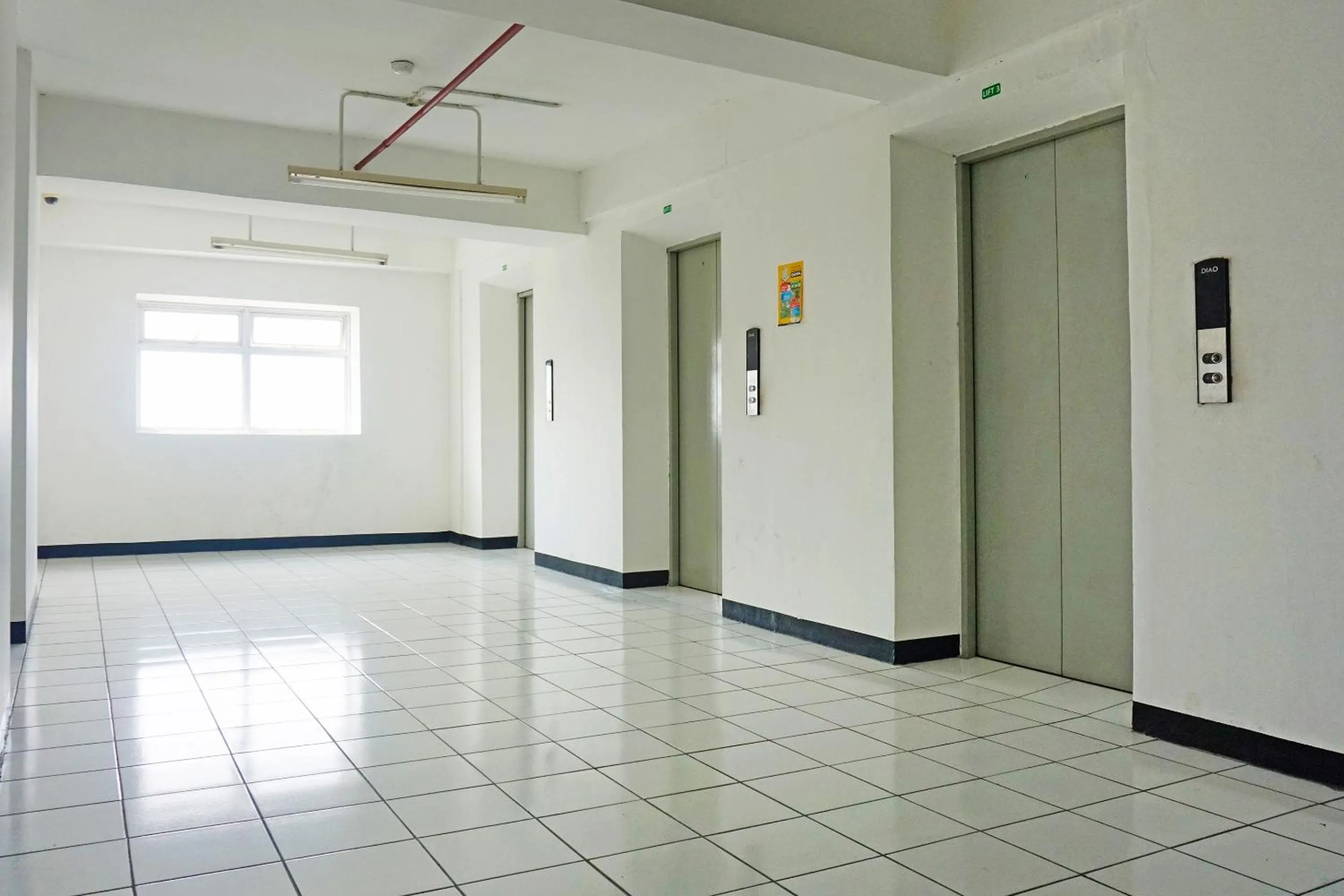 Lobby or reception in OYO 91593 San San Rooms Apartment Gunung Putri Square