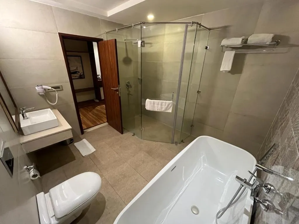 Bathroom in Pinaka Hotels & Resorts