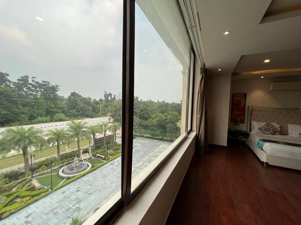 Garden view, Bed in Pinaka Hotels & Resorts