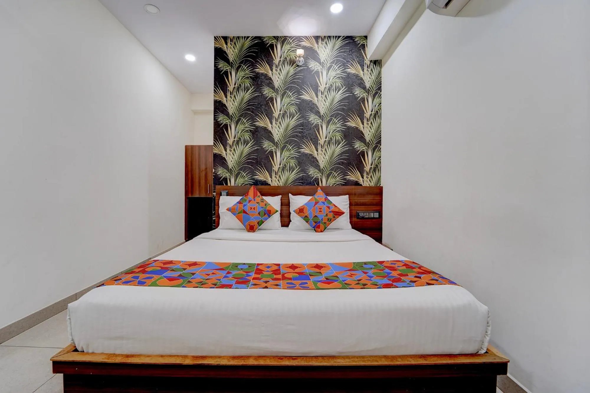 Bed in FabHotel NRM Residency