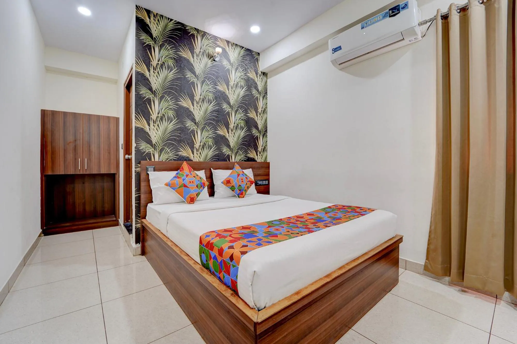 Bed in FabHotel NRM Residency