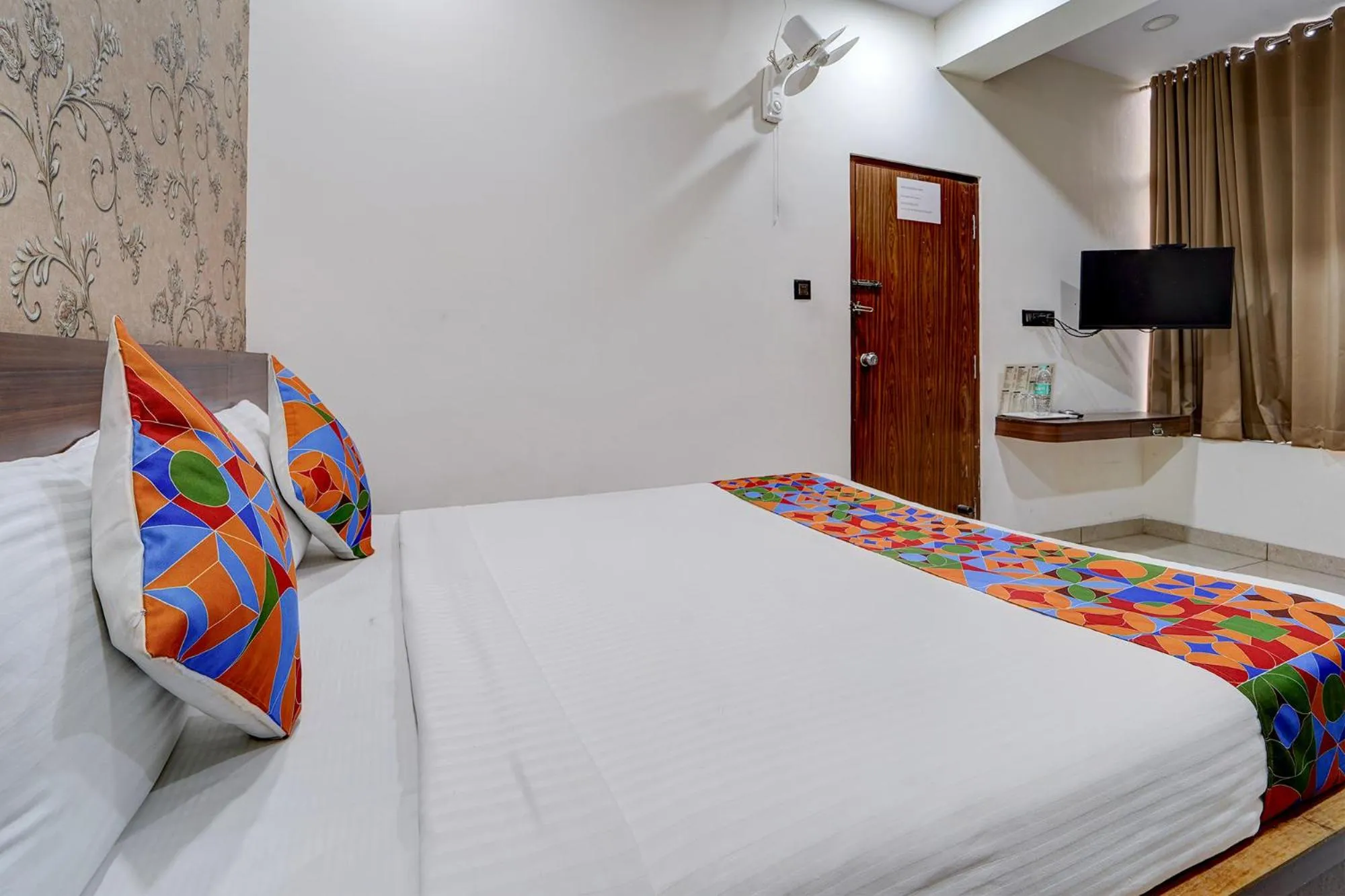 Bed in FabHotel NRM Residency